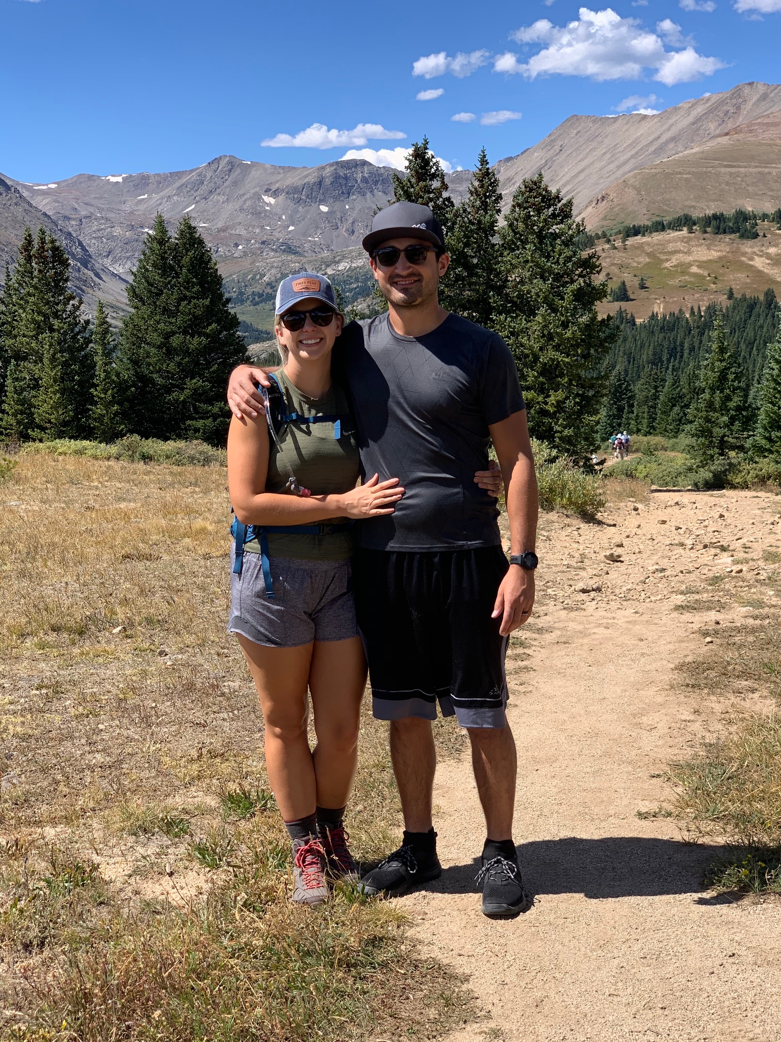 A couple posing in a valley