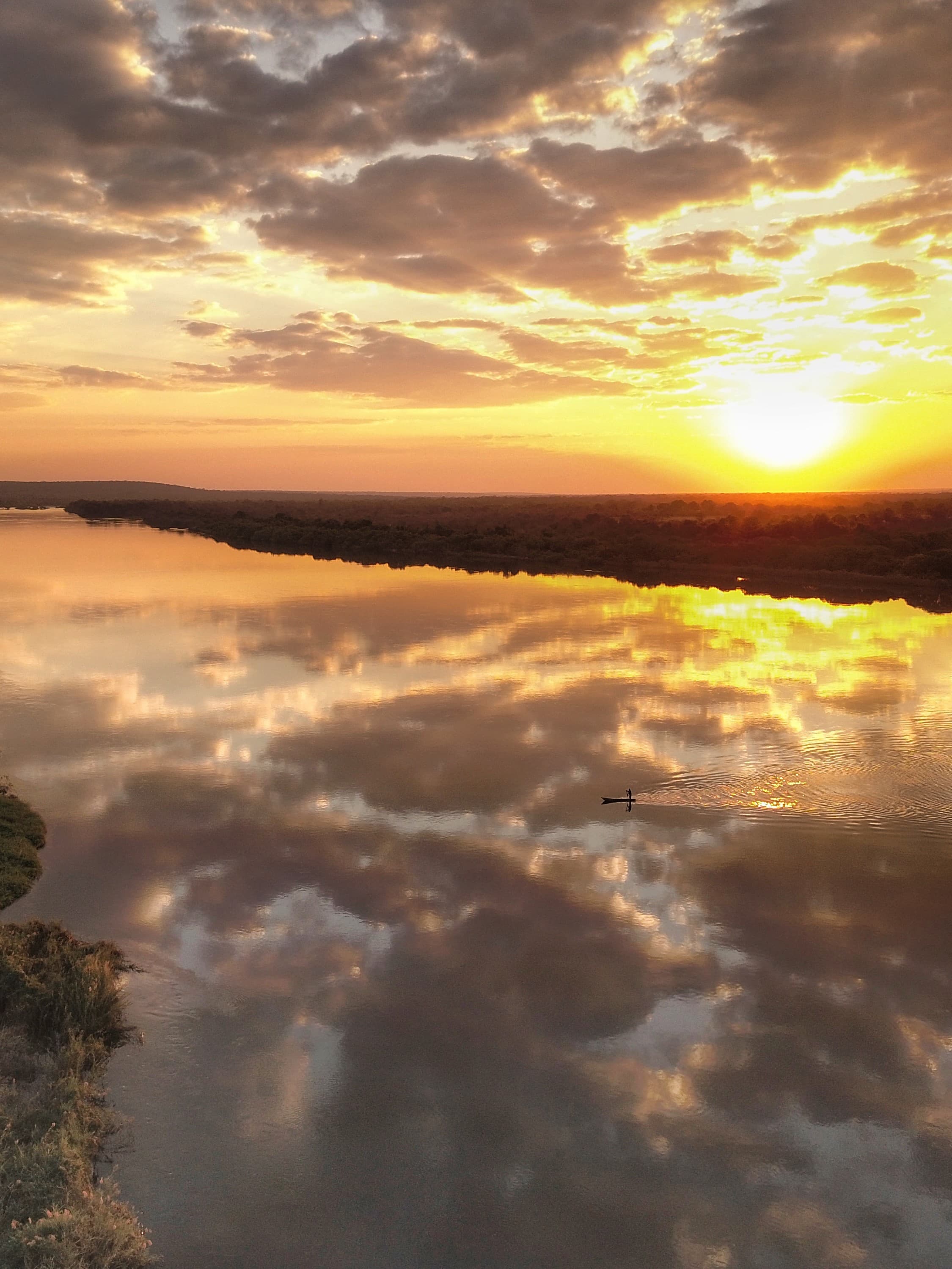 A sunset reflecting against the water