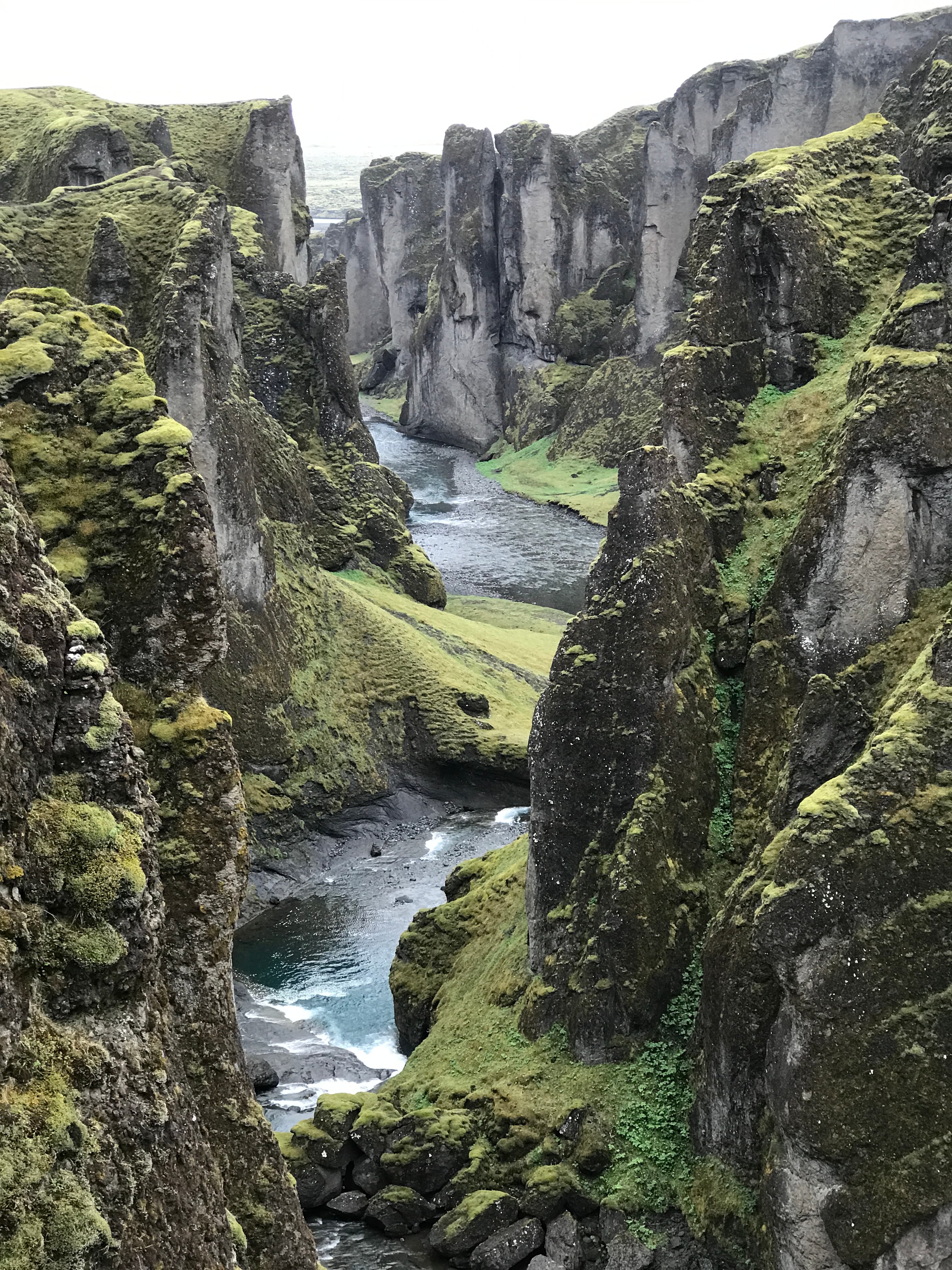 A serene lake nestled between majestic peaks