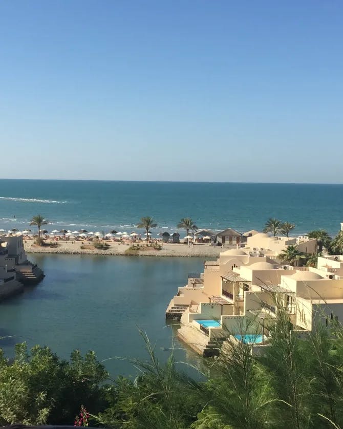 Picture of The Cove Rotana Resort surrounded by water, white buildings and trees