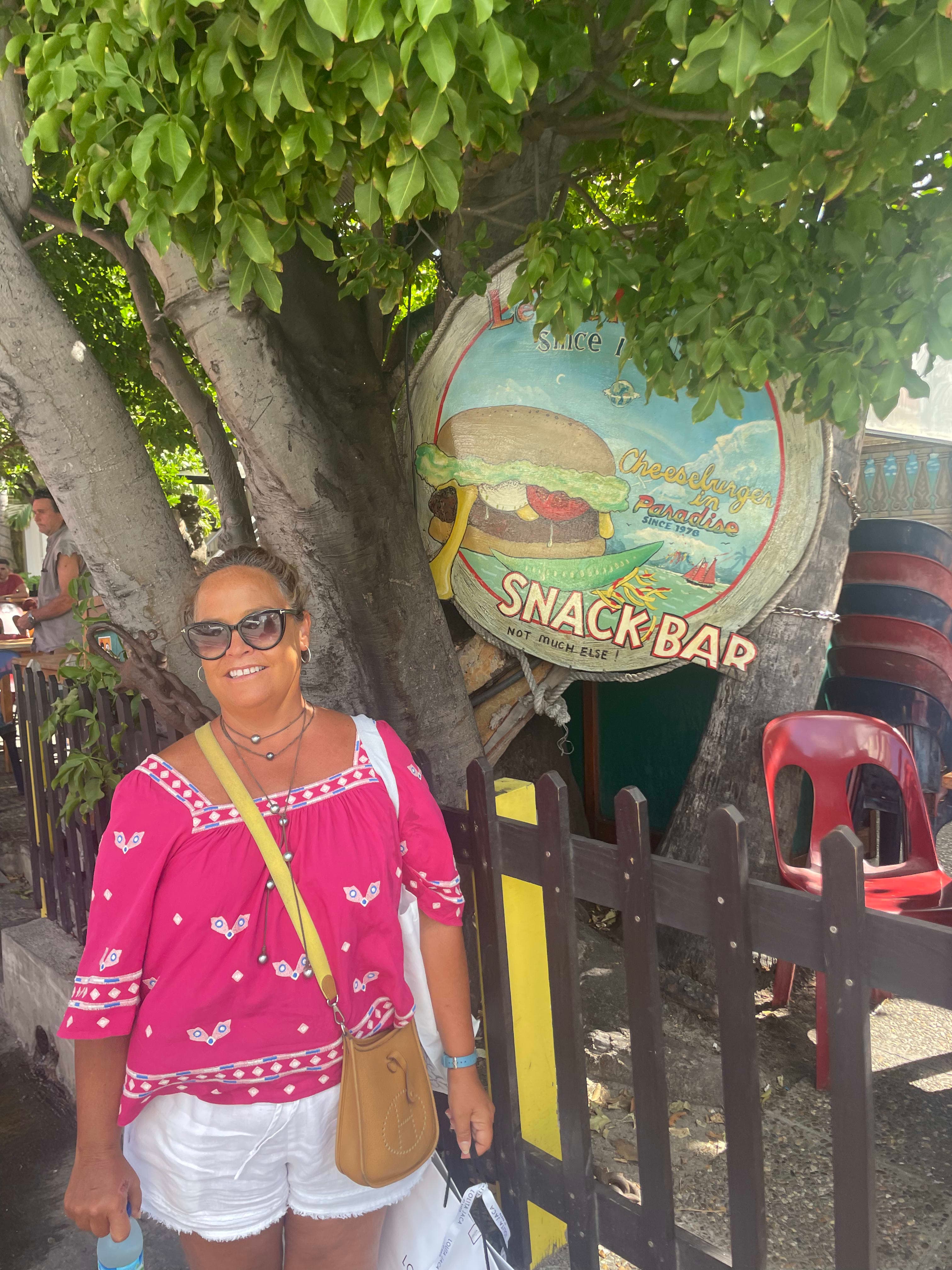 Picture of Tracey with snack bar sign