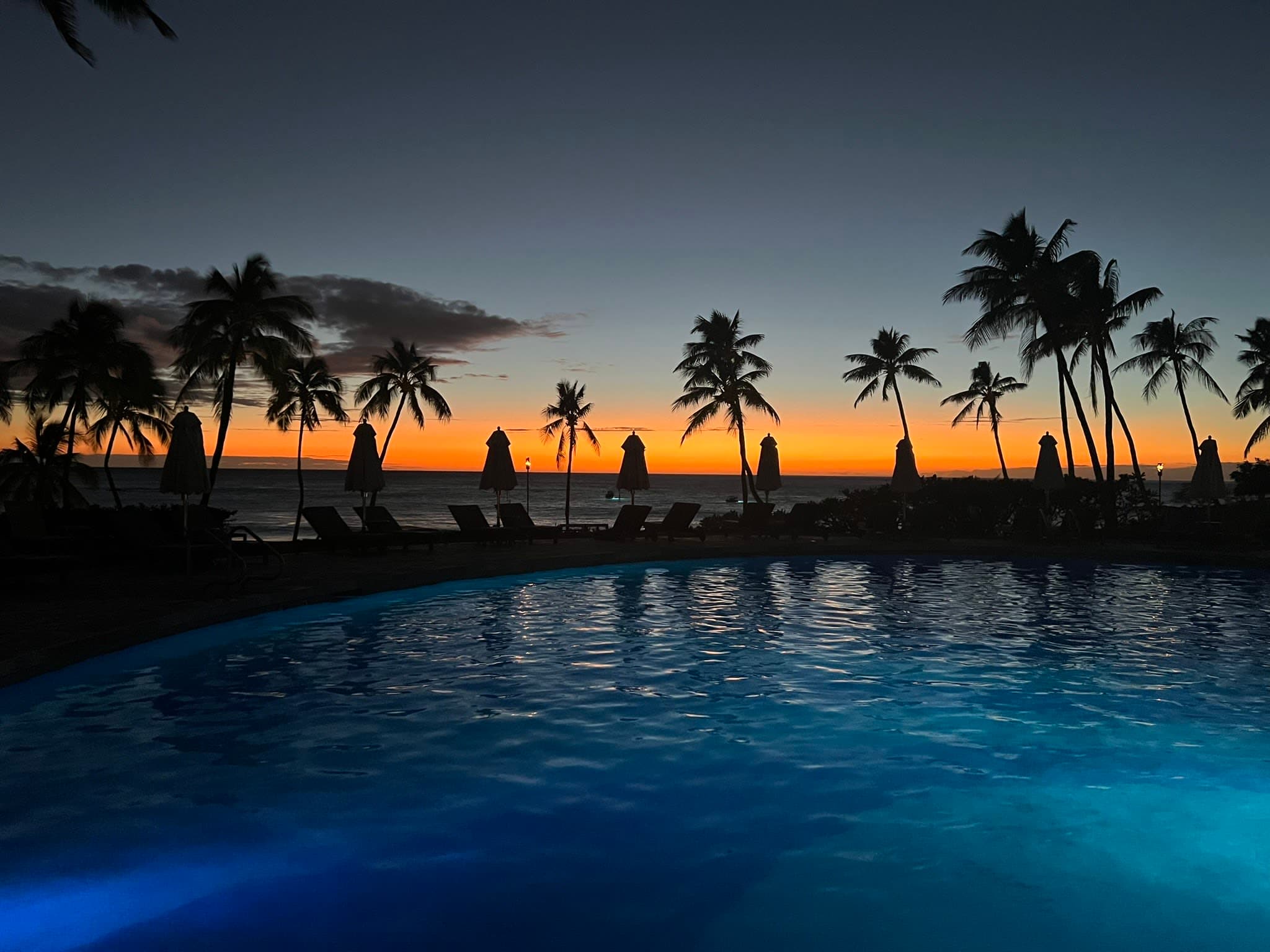 View of the pool at sunset