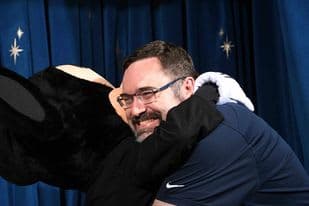 Edward Bober hugging mickey mouse
