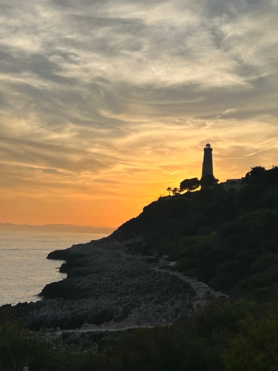 Beautiful view of a lighthouse and sunset