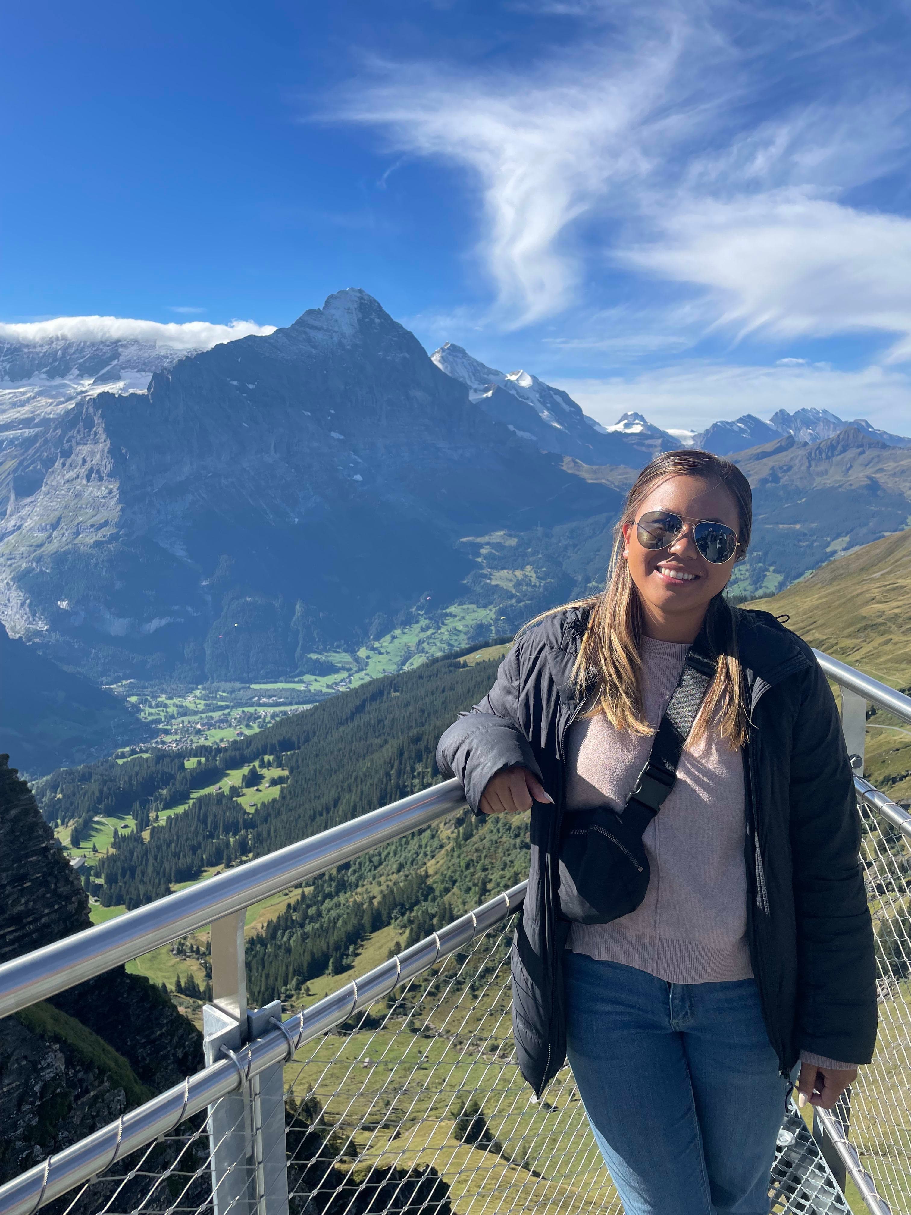 Posing for a photo with the beautiful views of the mountains in the background
