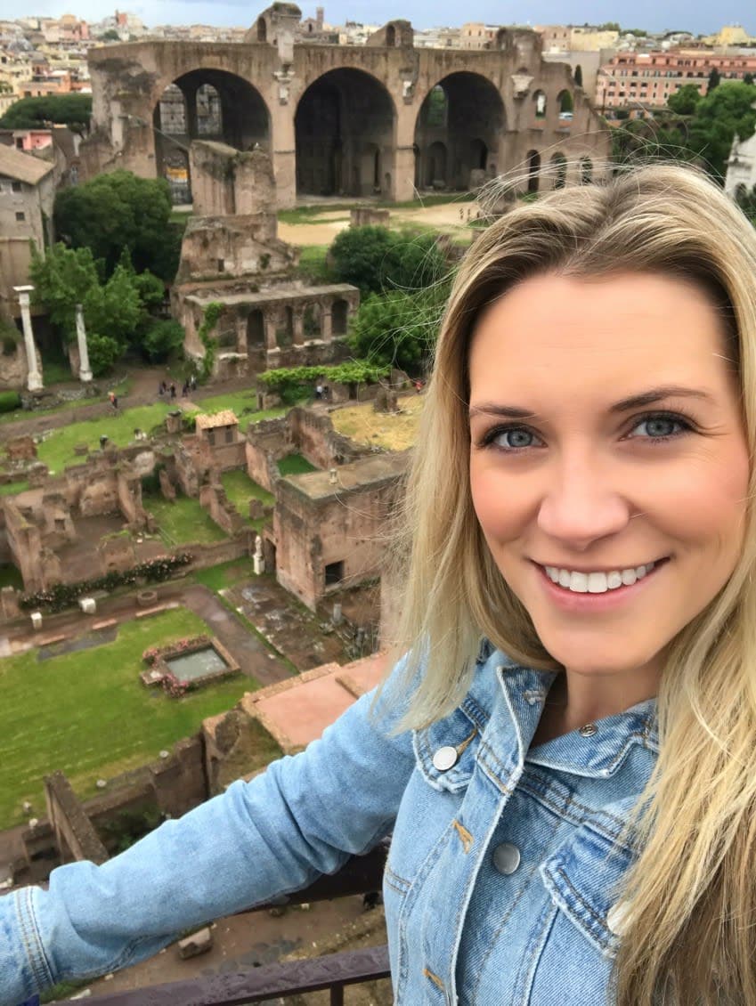 Image of advisor with ruins in the distance
