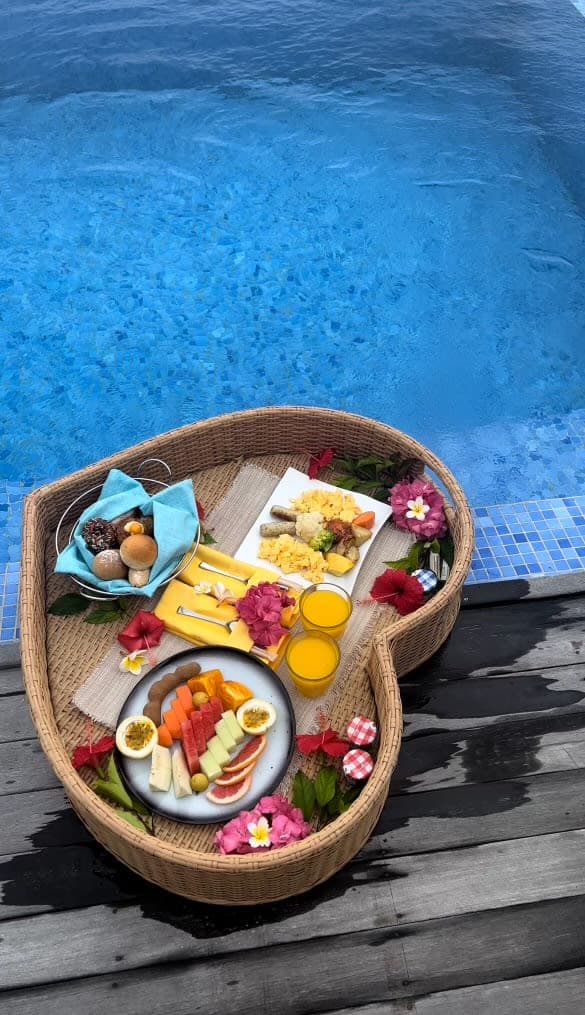 Breakfast on a floating tray in the pool