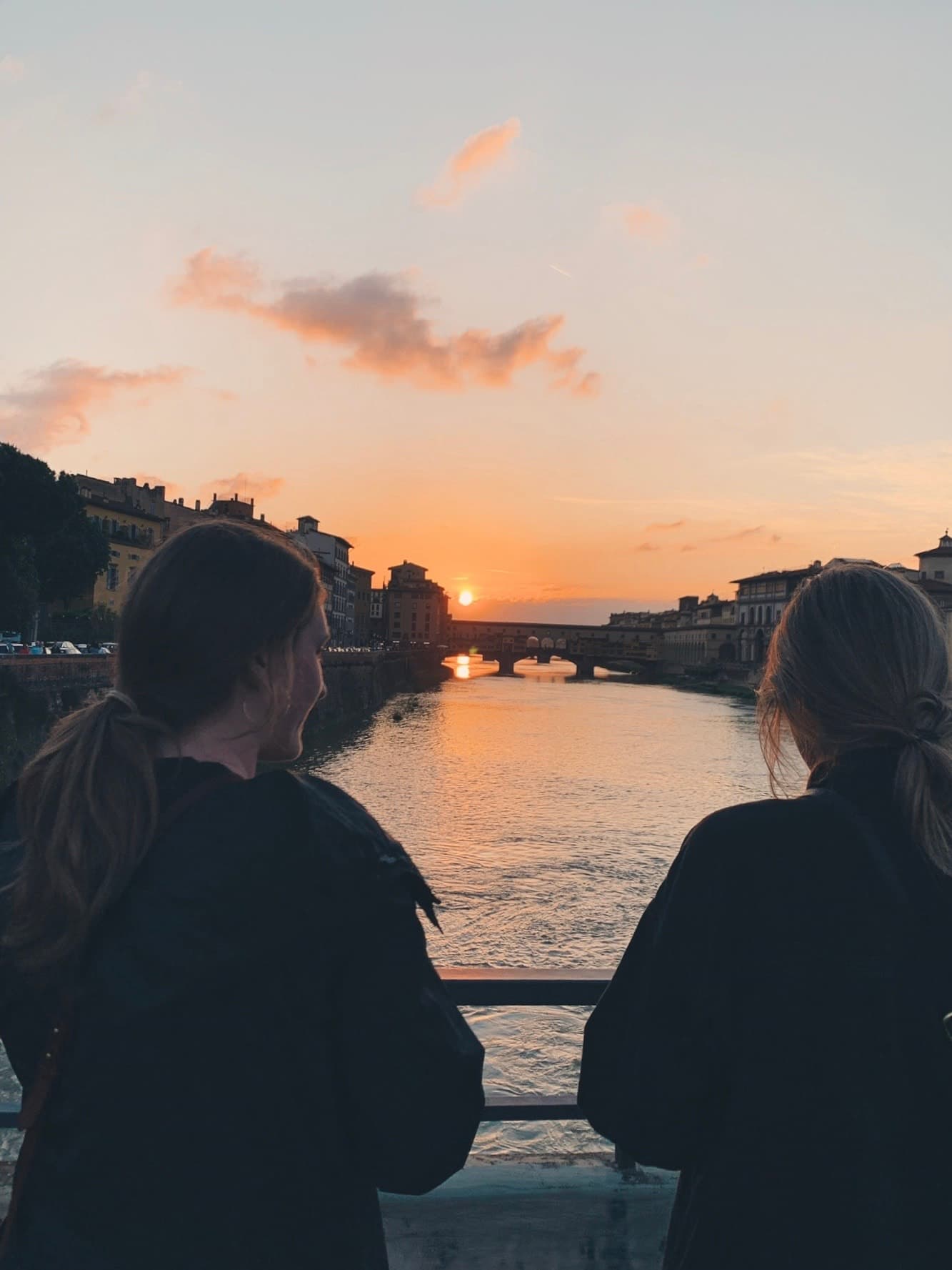 Watching the sunset from the bridge with a friend