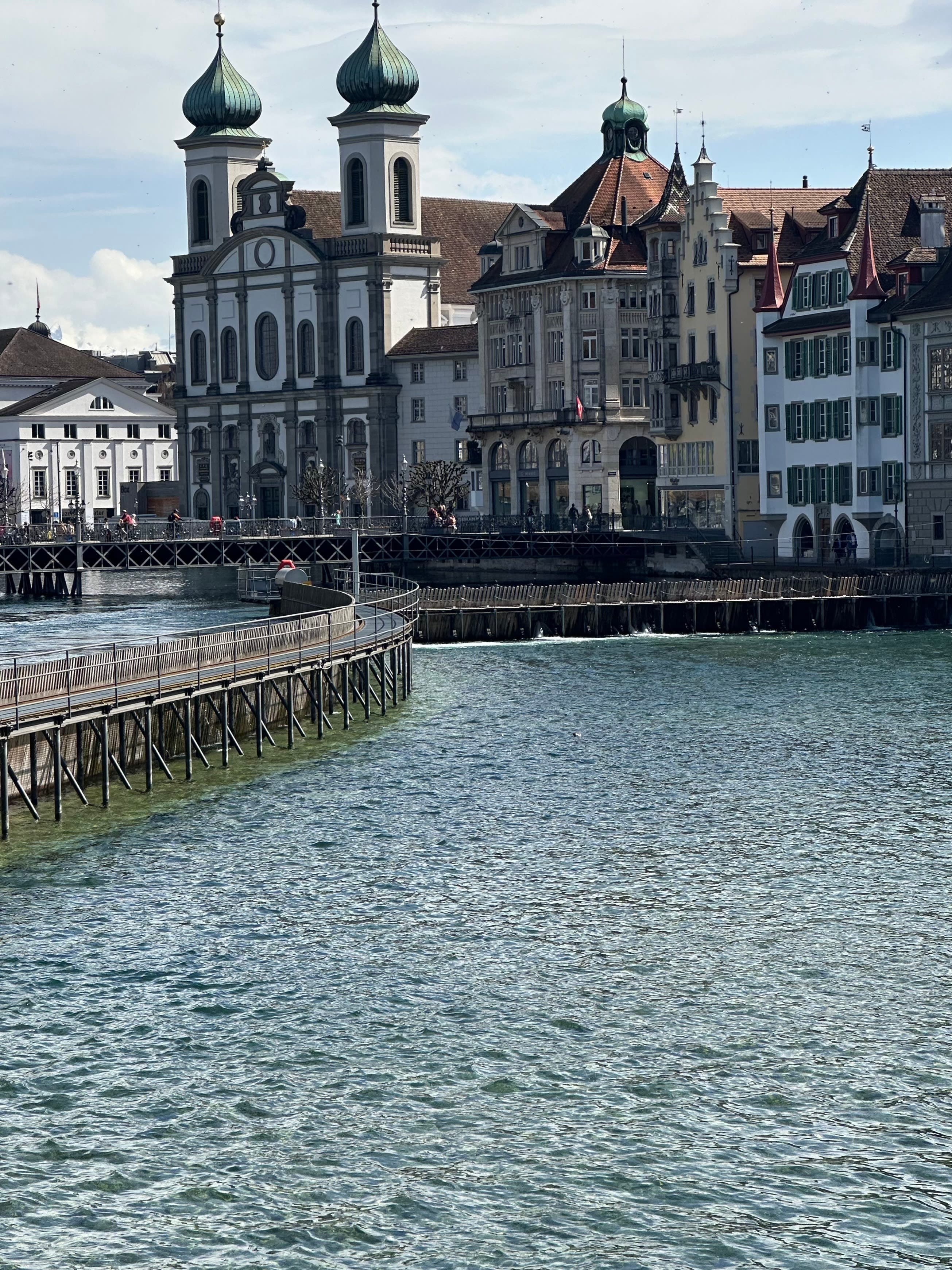 View of the river with Jesuitenkirche Hl. Franz Xaver church