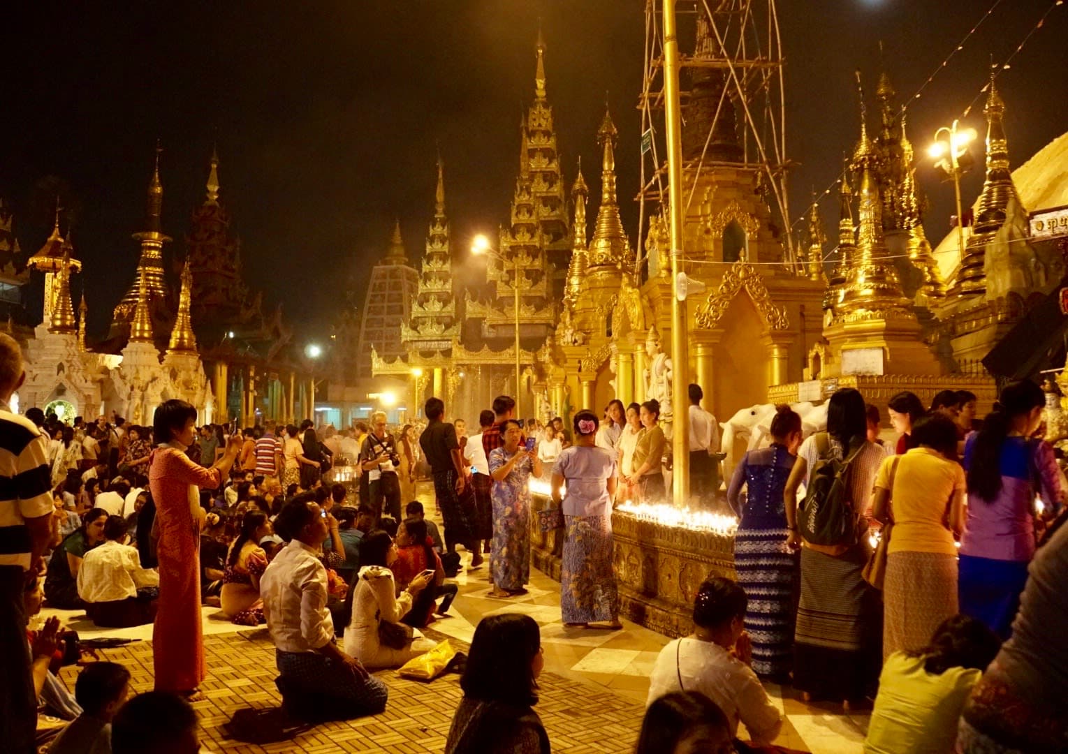People worshipping at Shwedagon Pagoda