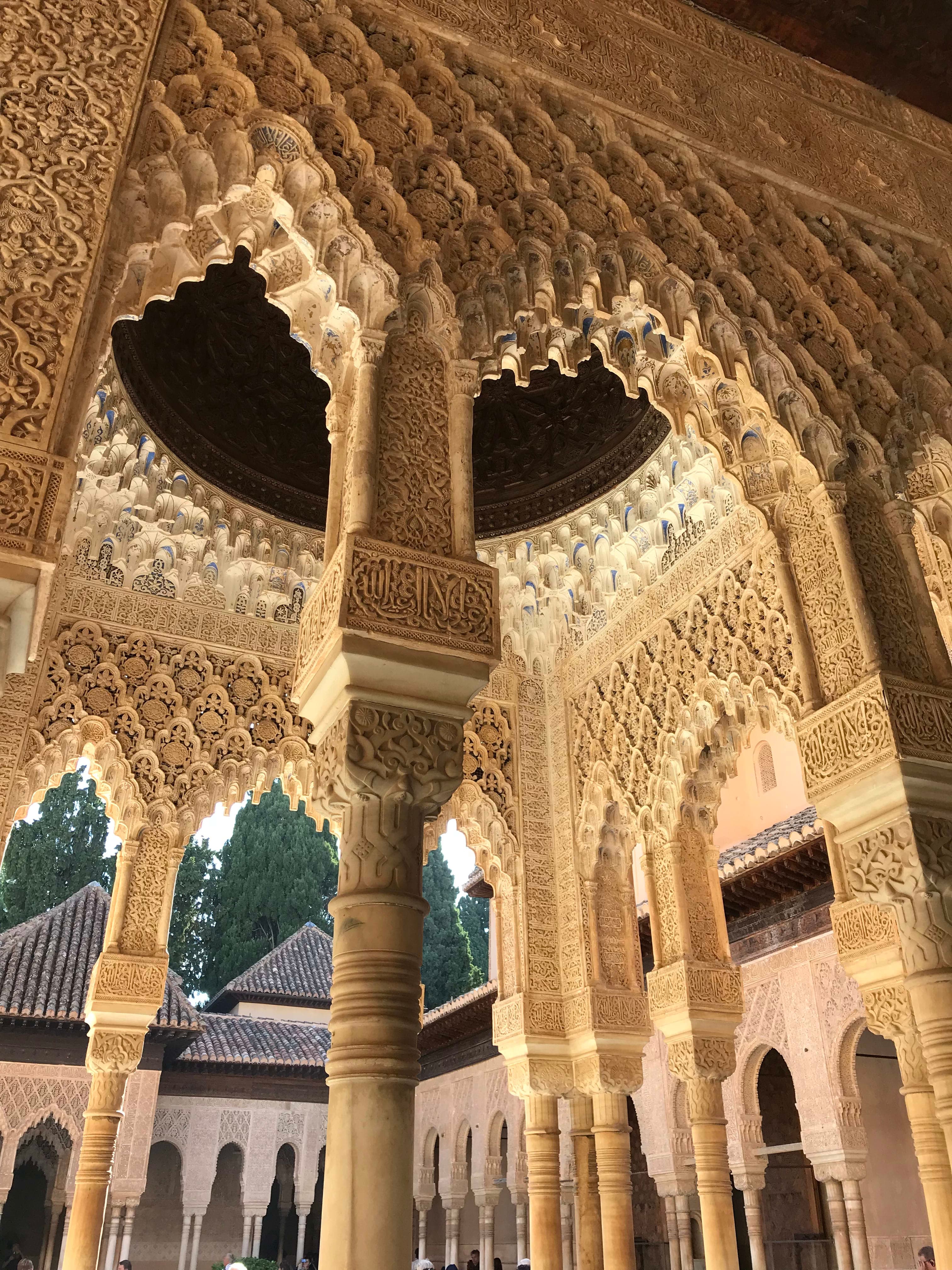 Beautiful ornate carvings and arches of the Patio de Los Leones