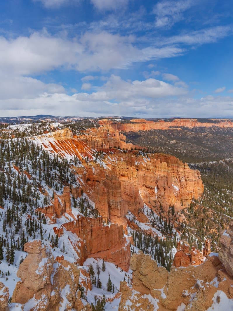 View of a rocky canyon with snow covering the terrain