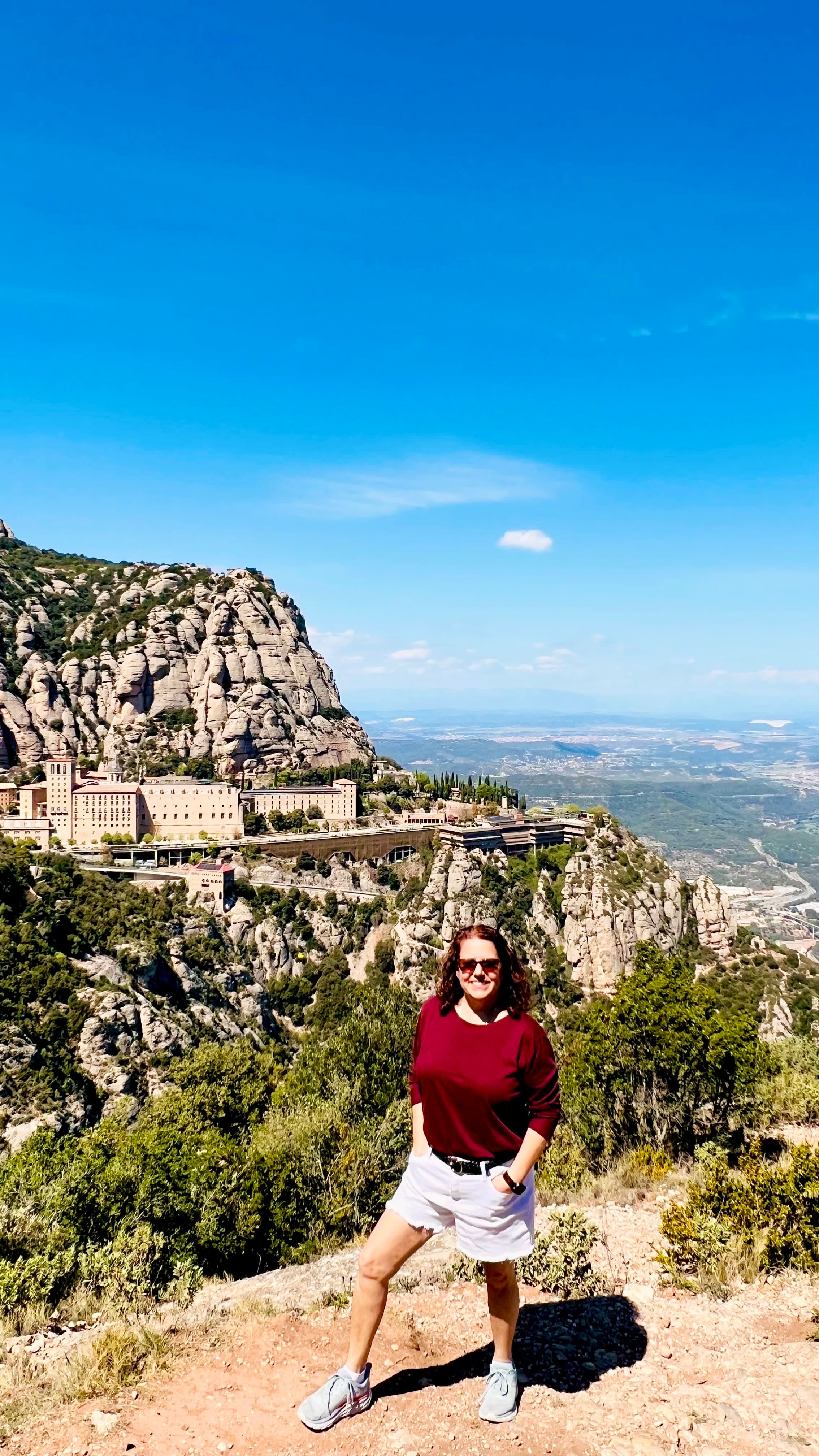 Vivian posing on a mountain on a nice sunny day