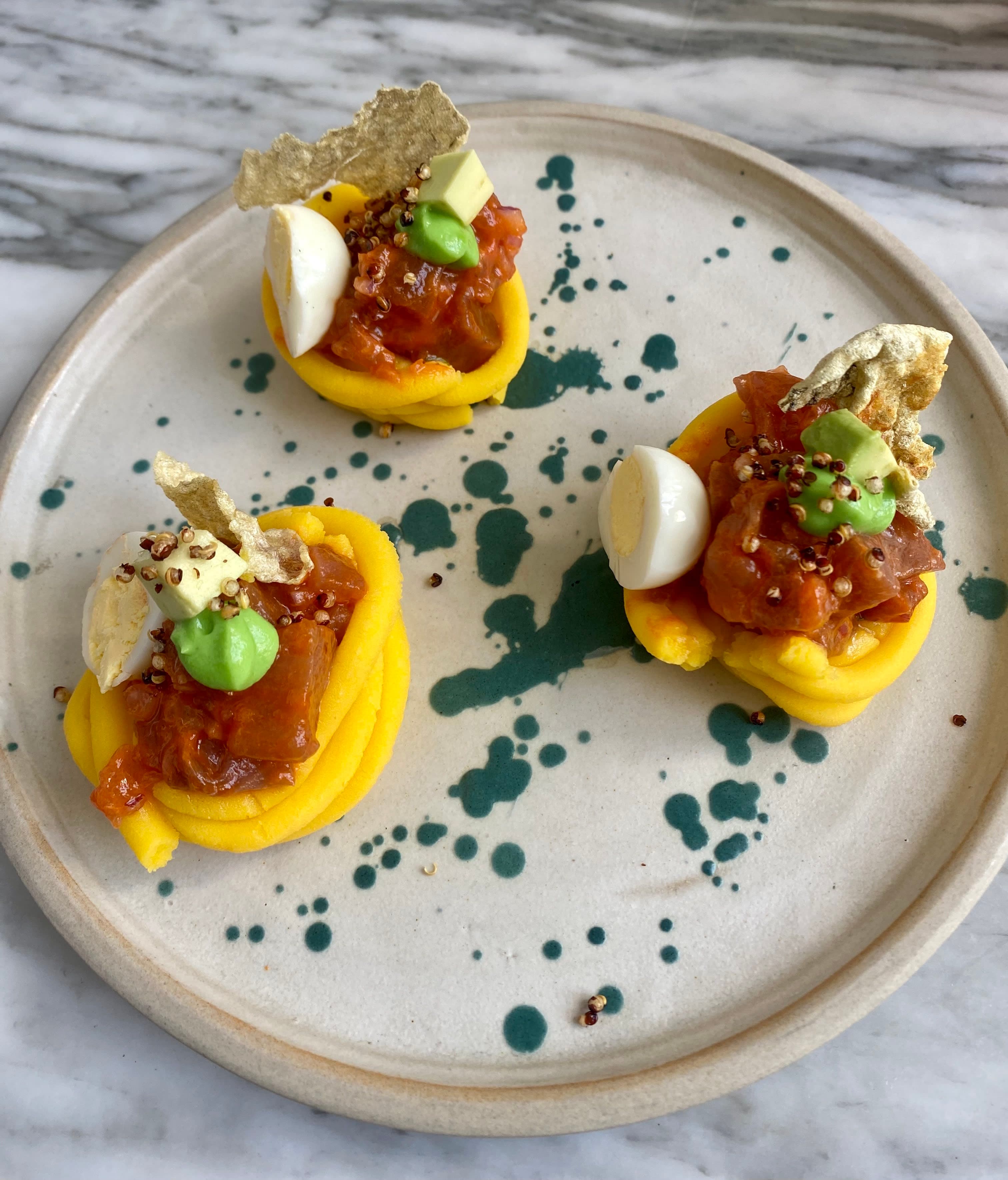 Ahi tuna on an elegant plate on a marble table