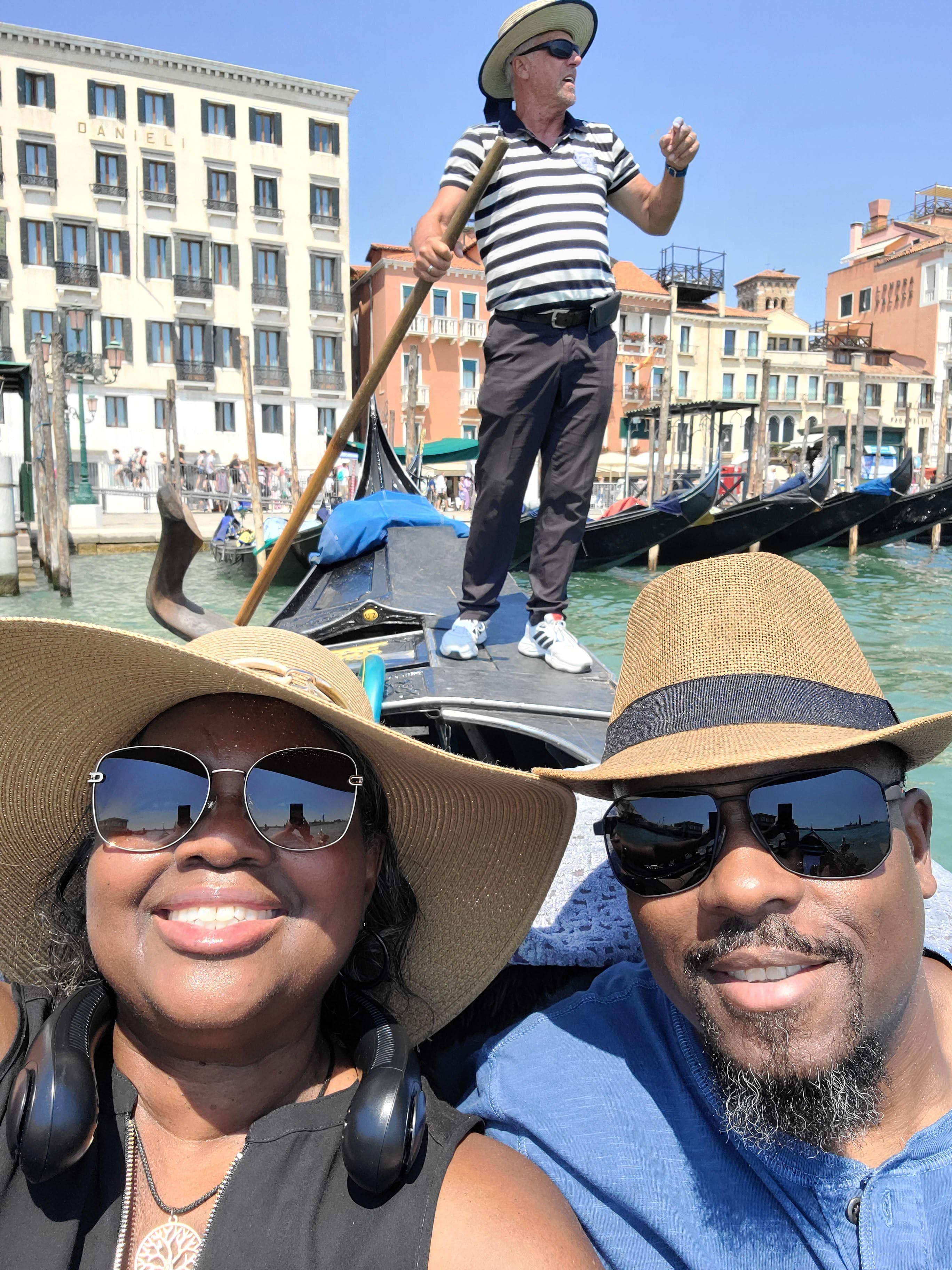 A couple taking a selfie in a boat