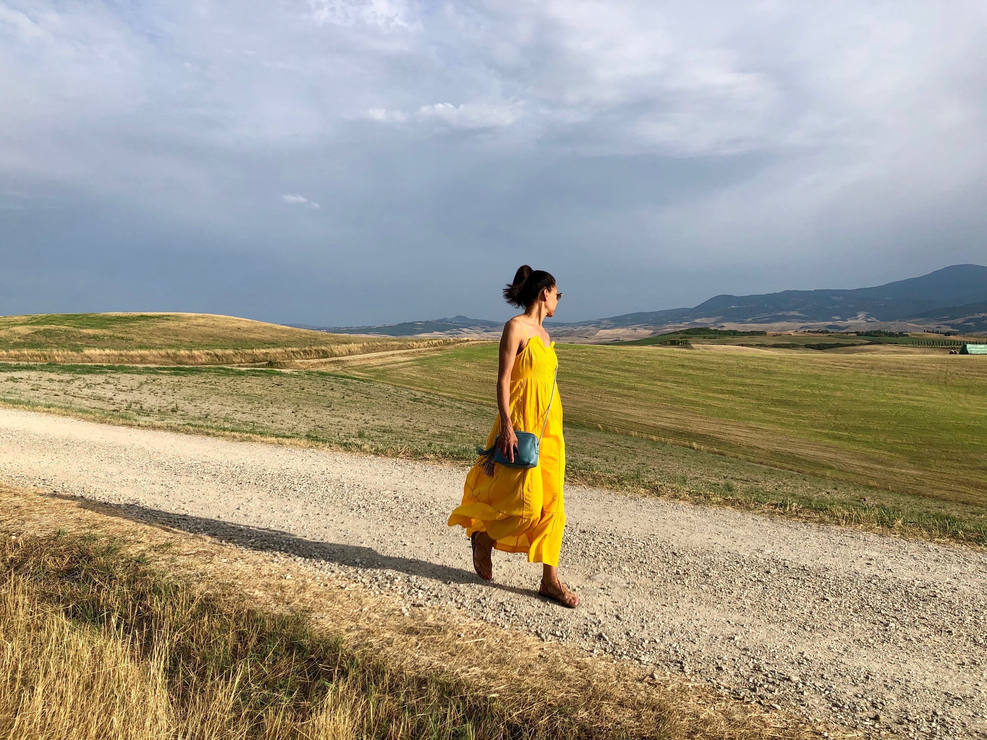 Michaelyn in a yellow dress in field
