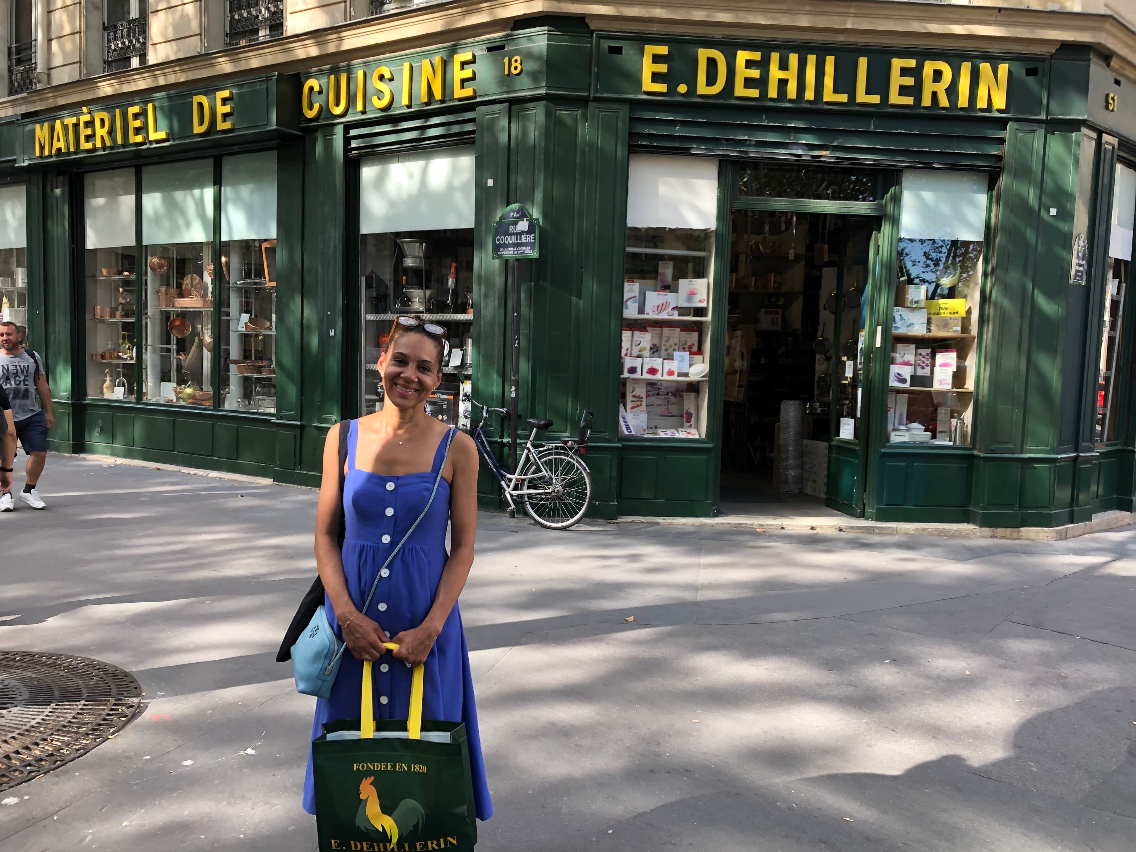 Michaelyn outside E. DEHILLERIN cafe