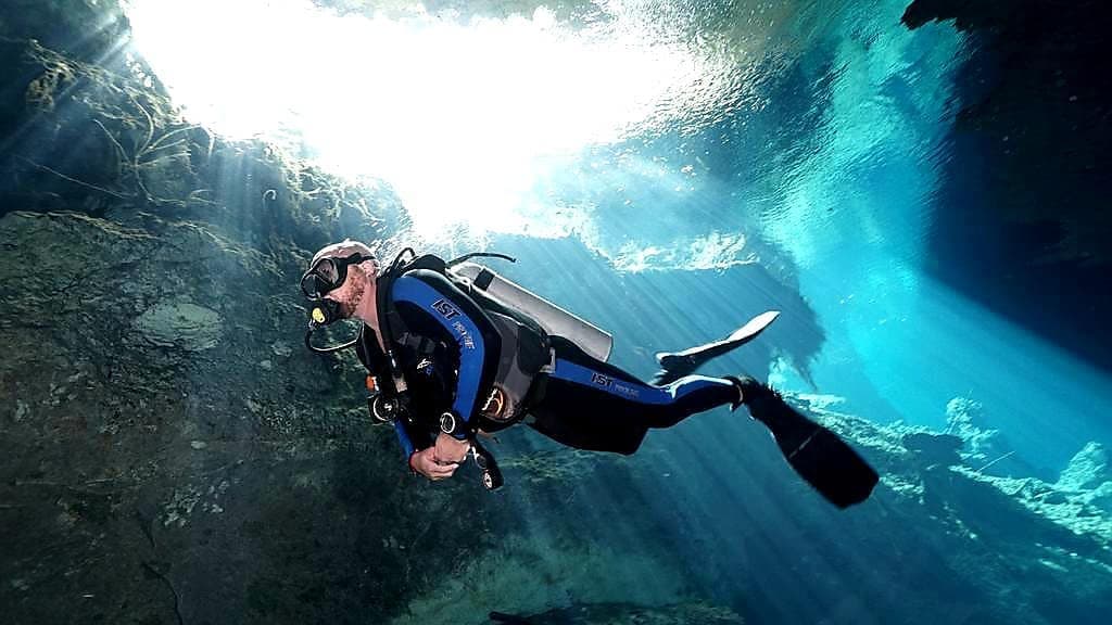 A man scuba diving in the sea