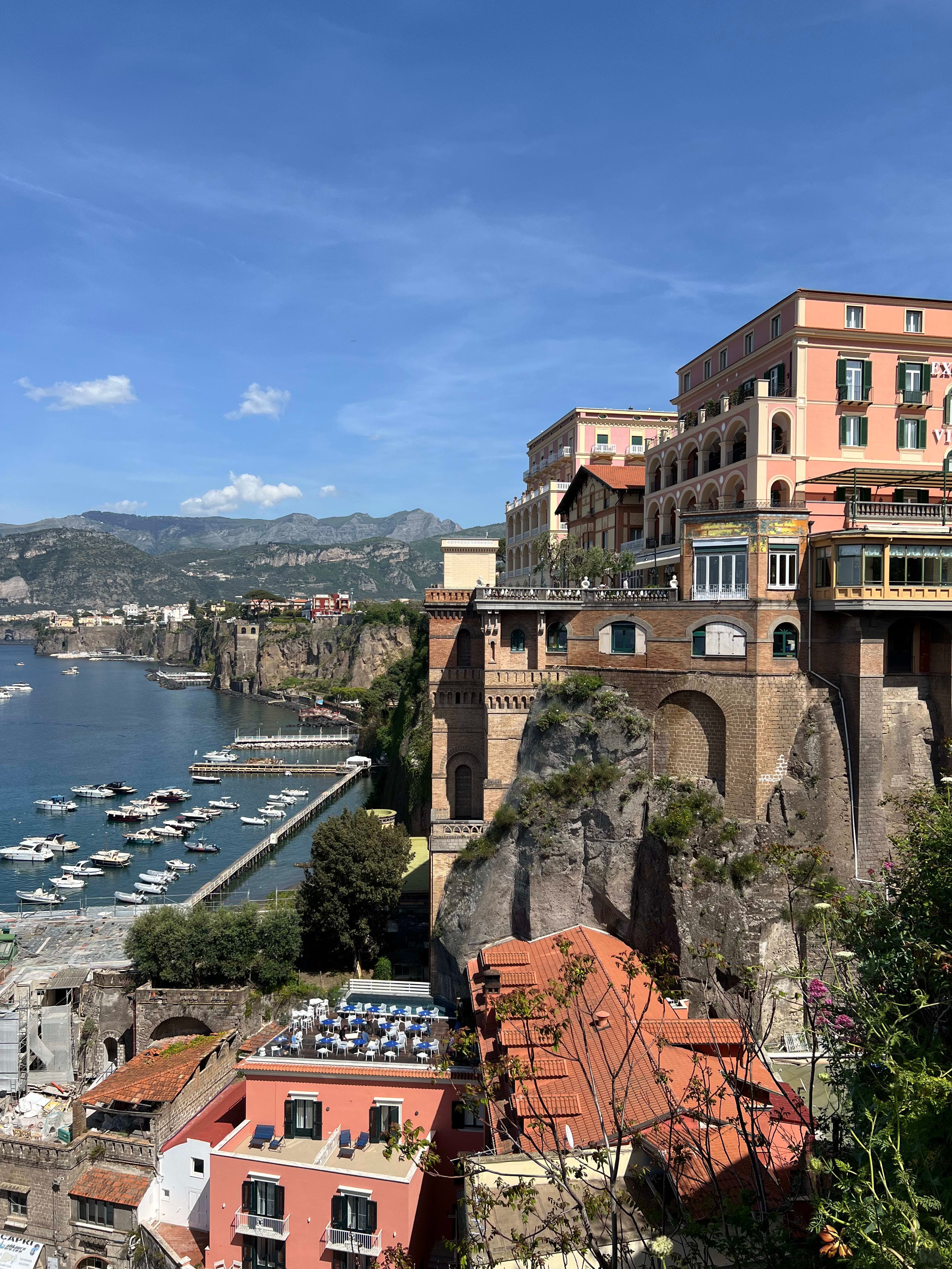 Photo of the Old Town Sorrento, ships docked at the pier are visible in a distance
