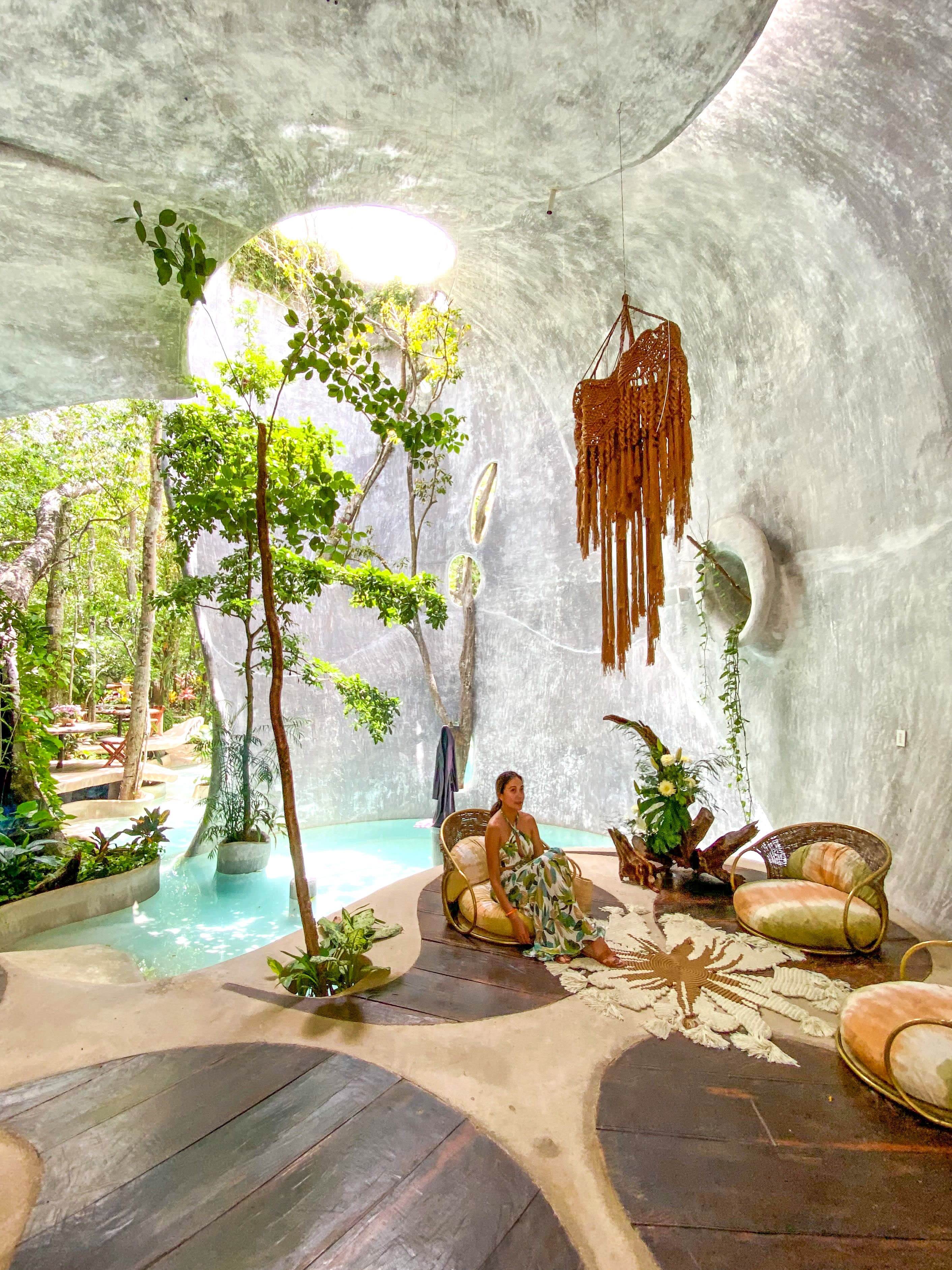 Pam sitting inside SFER IK Uh May an art center in Tulum