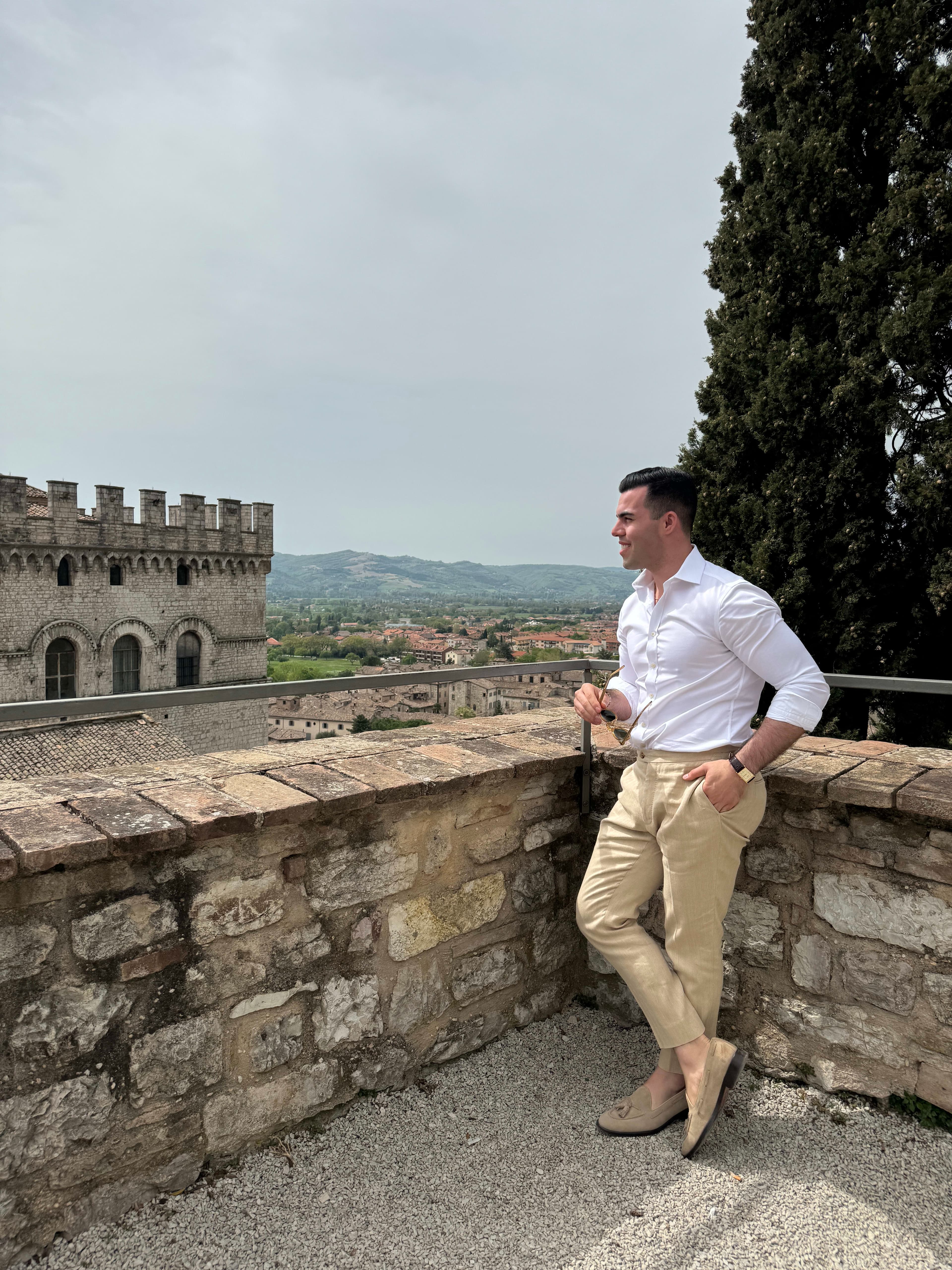 Grayson standing at the roof of Palazzo Ducale and enjoying the view