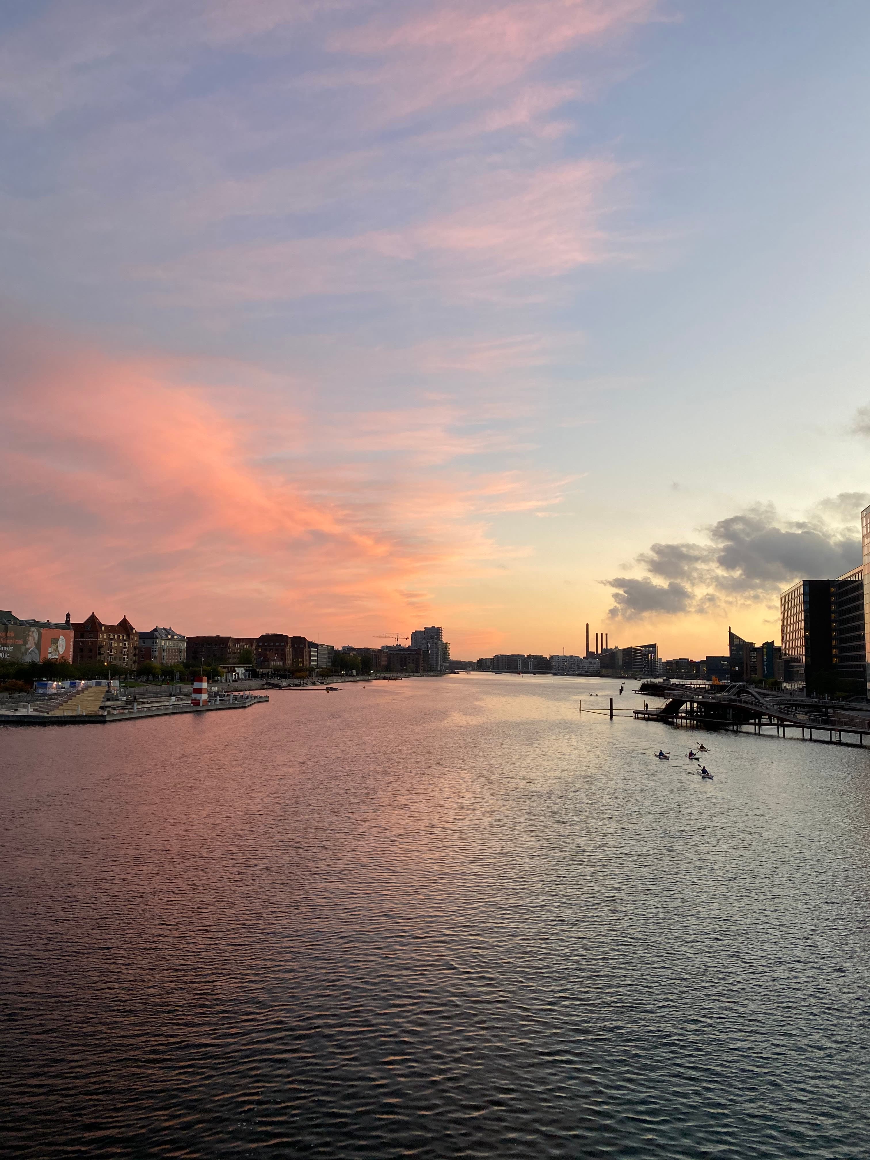 Beautiful view of a pastel colored sky at sunset over a wide river