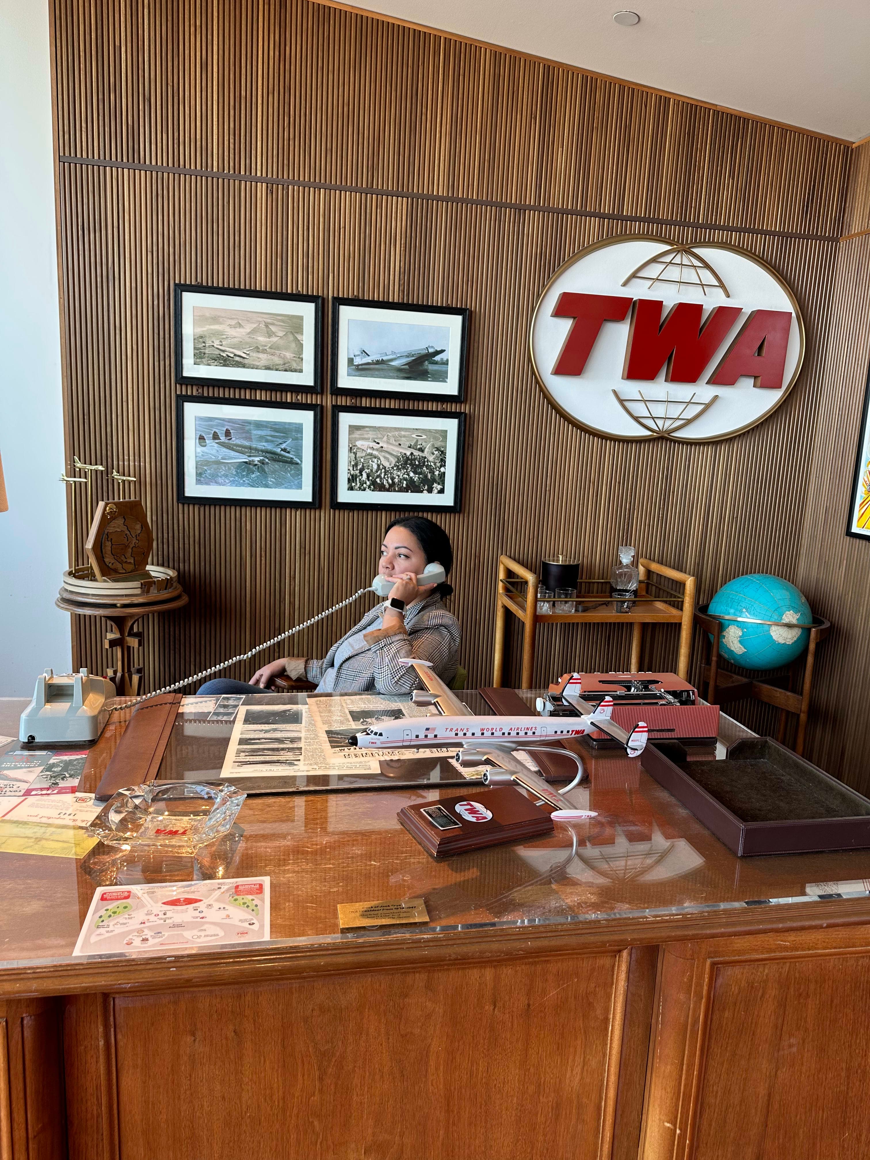 Picture of Geona in office on a call