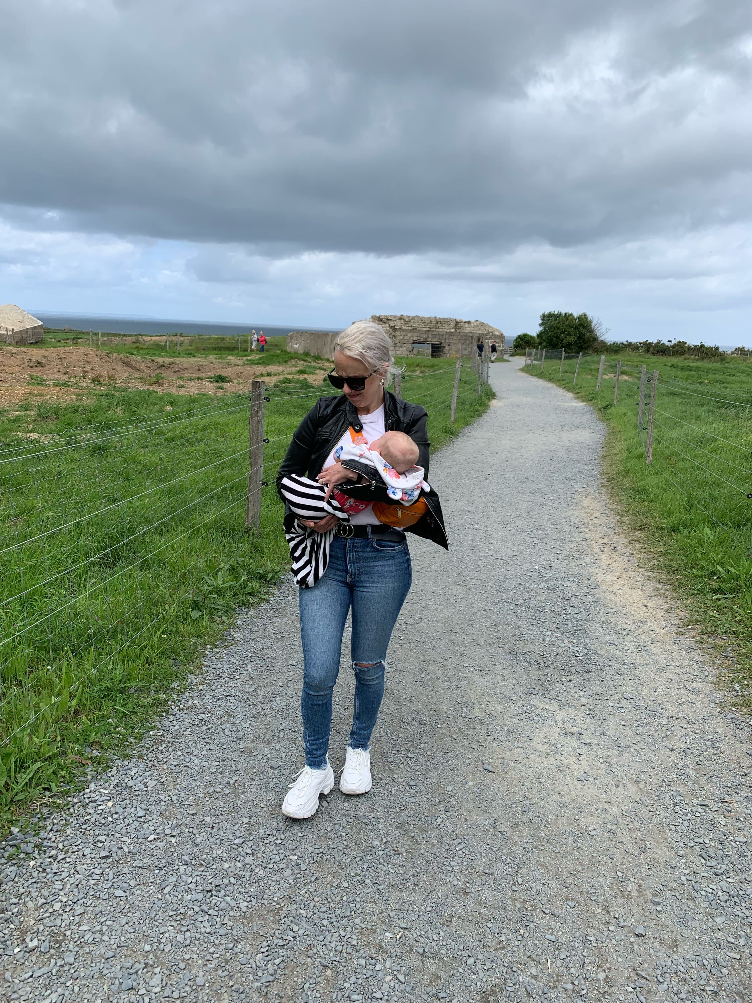 Picture of Leah with a baby on a road