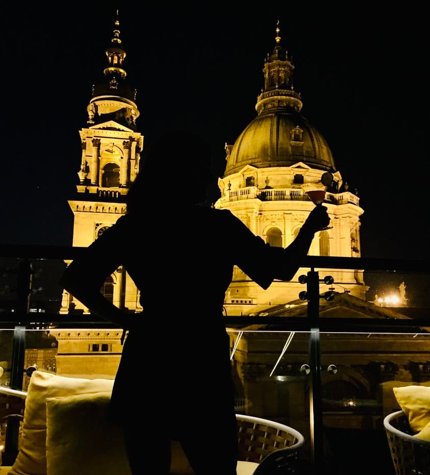 Picture of Katie having drink at Aria Hotel Budapest by Library Hotel Collection