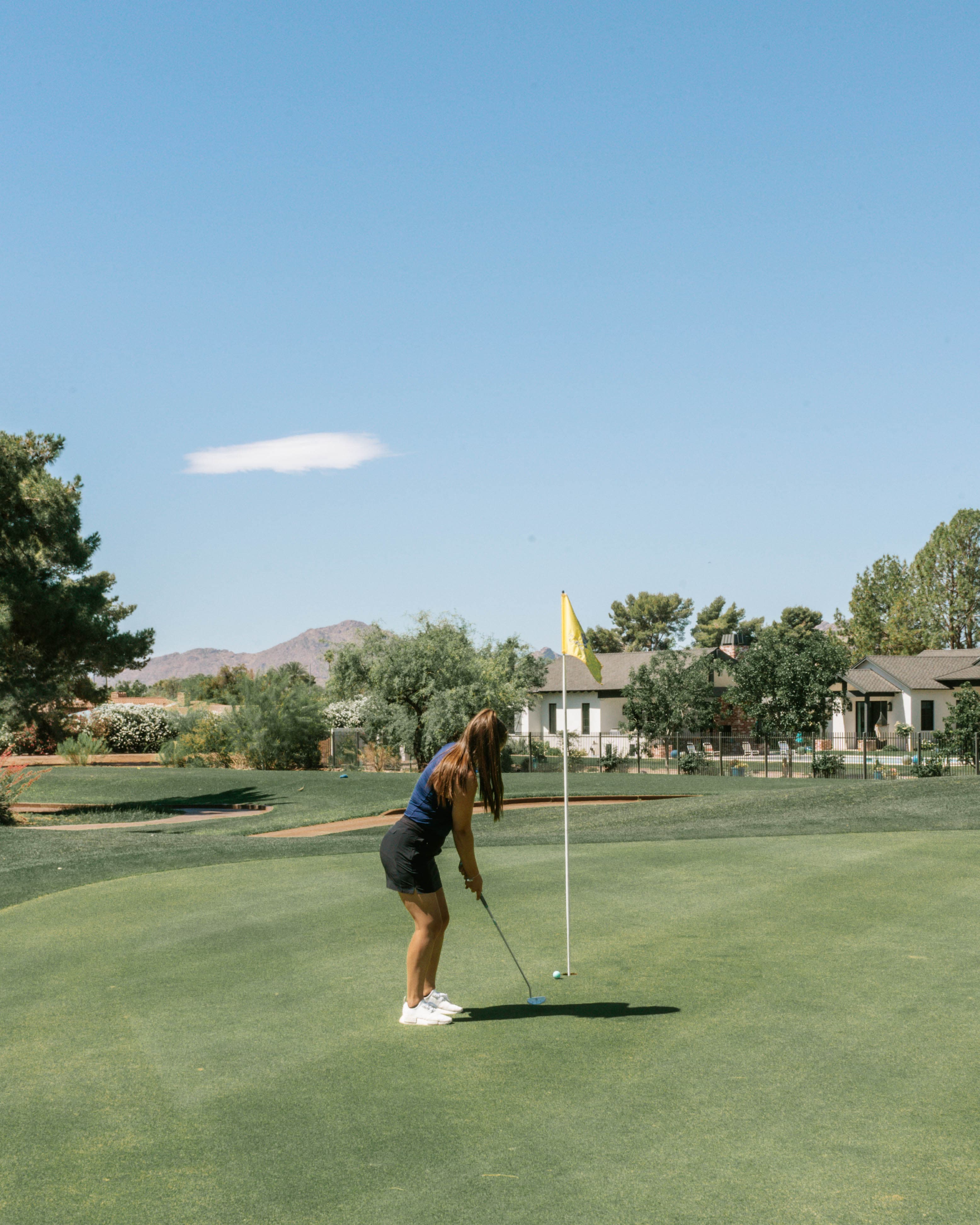 Picture of Taegan playing golf