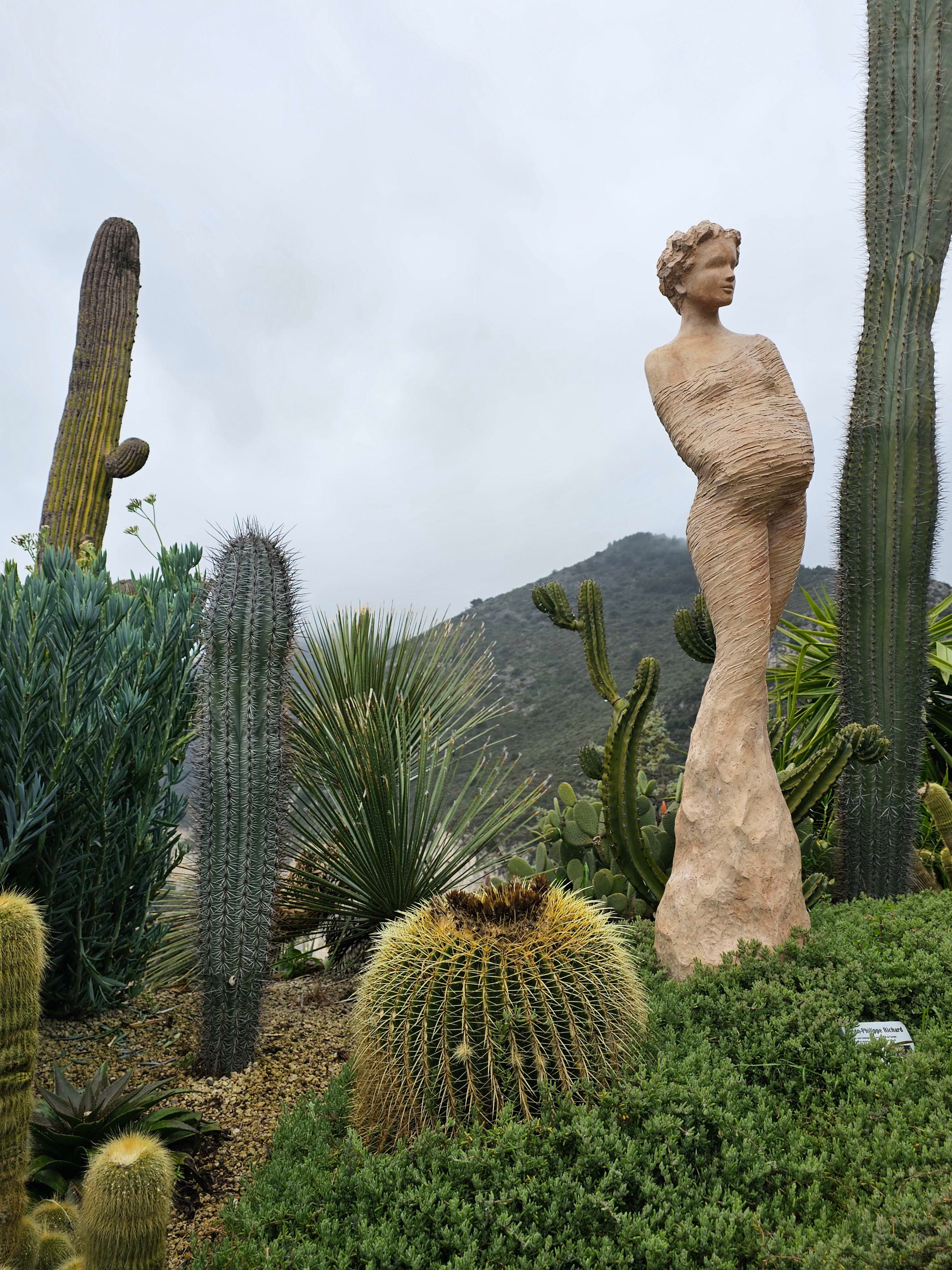 A statue and cacti in a beautiful setting Le Jardin Exotique Eze