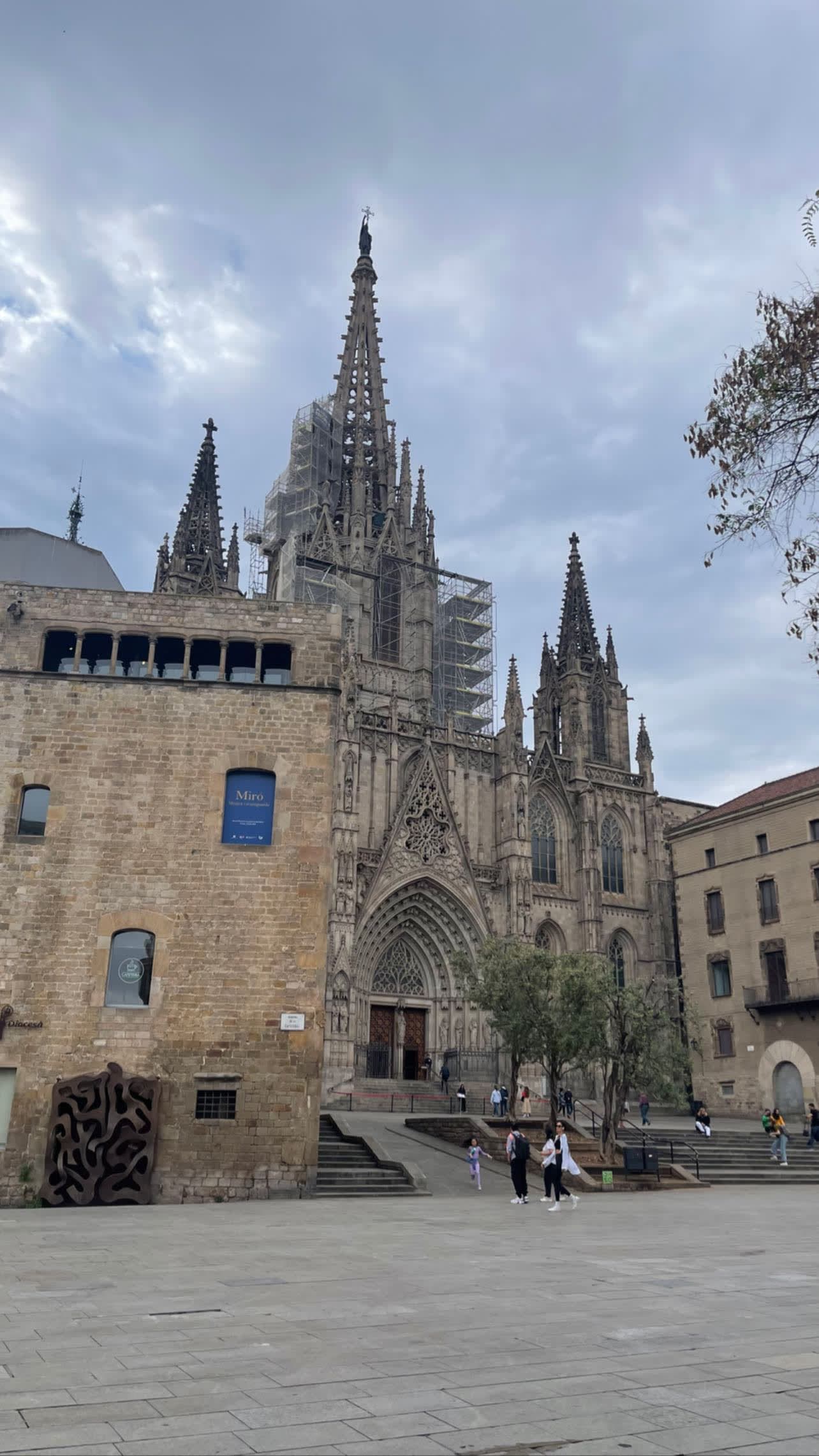 View of Barcelona’s Sagrada Familia, a beautiful cathedral, on a cloudy day