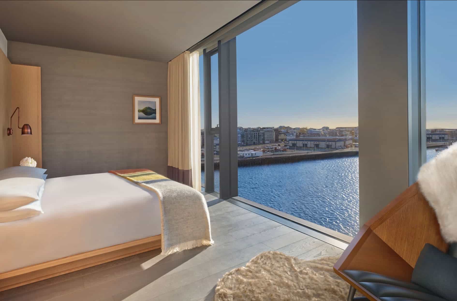 cozy bedroom with a water view