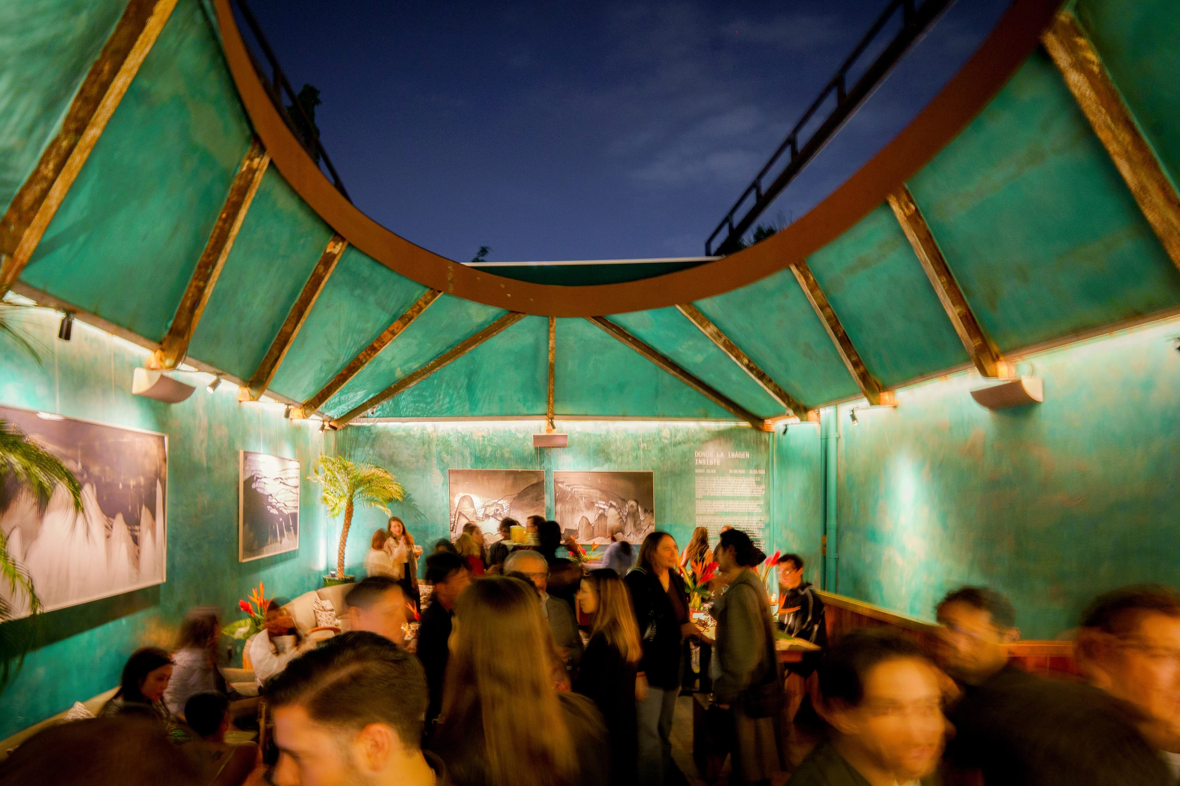 a group of people sit on a stone wall in Croatia