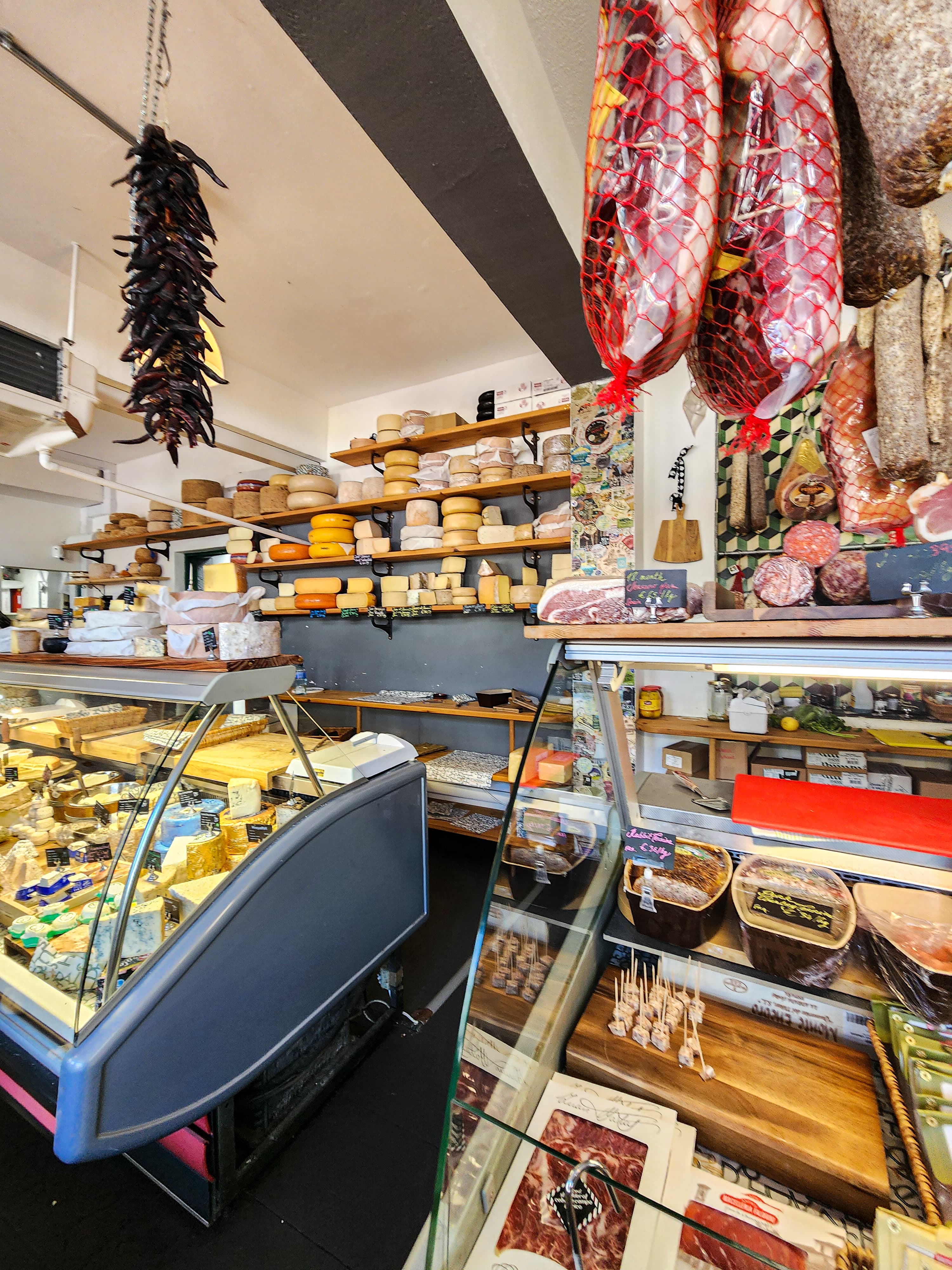 An image of a deli with delicious food options.