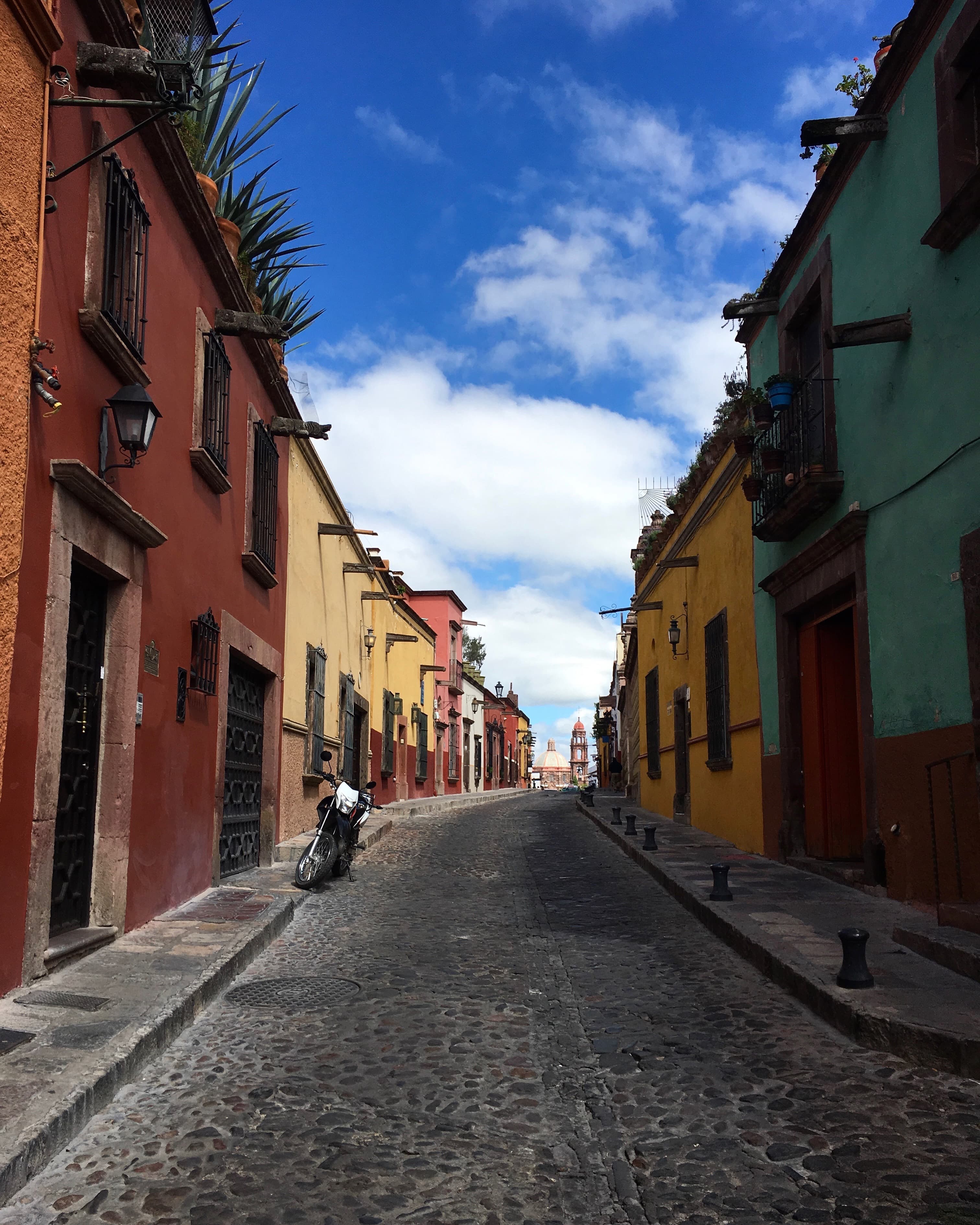 A quaint street with colorful buildings.