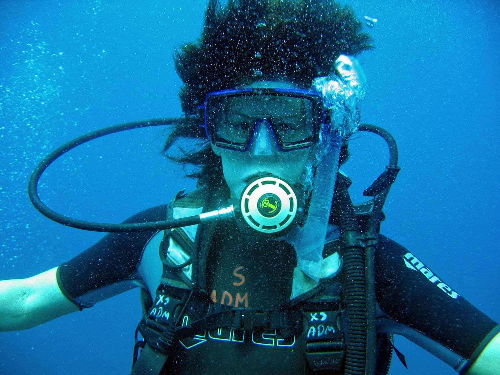 An underwater photo of Nancy scuba diving.