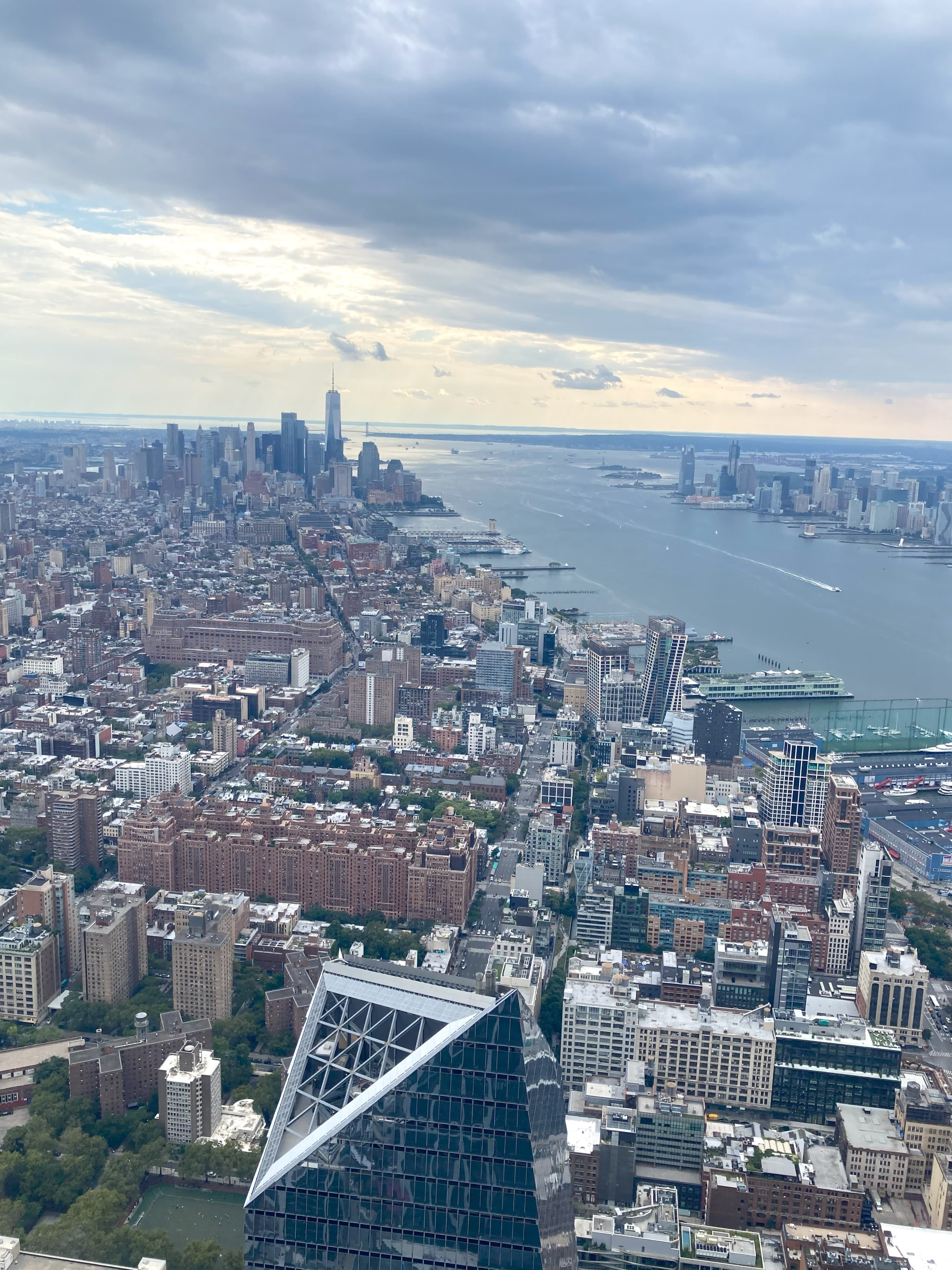 A aerial view of a city with a large river running through it.