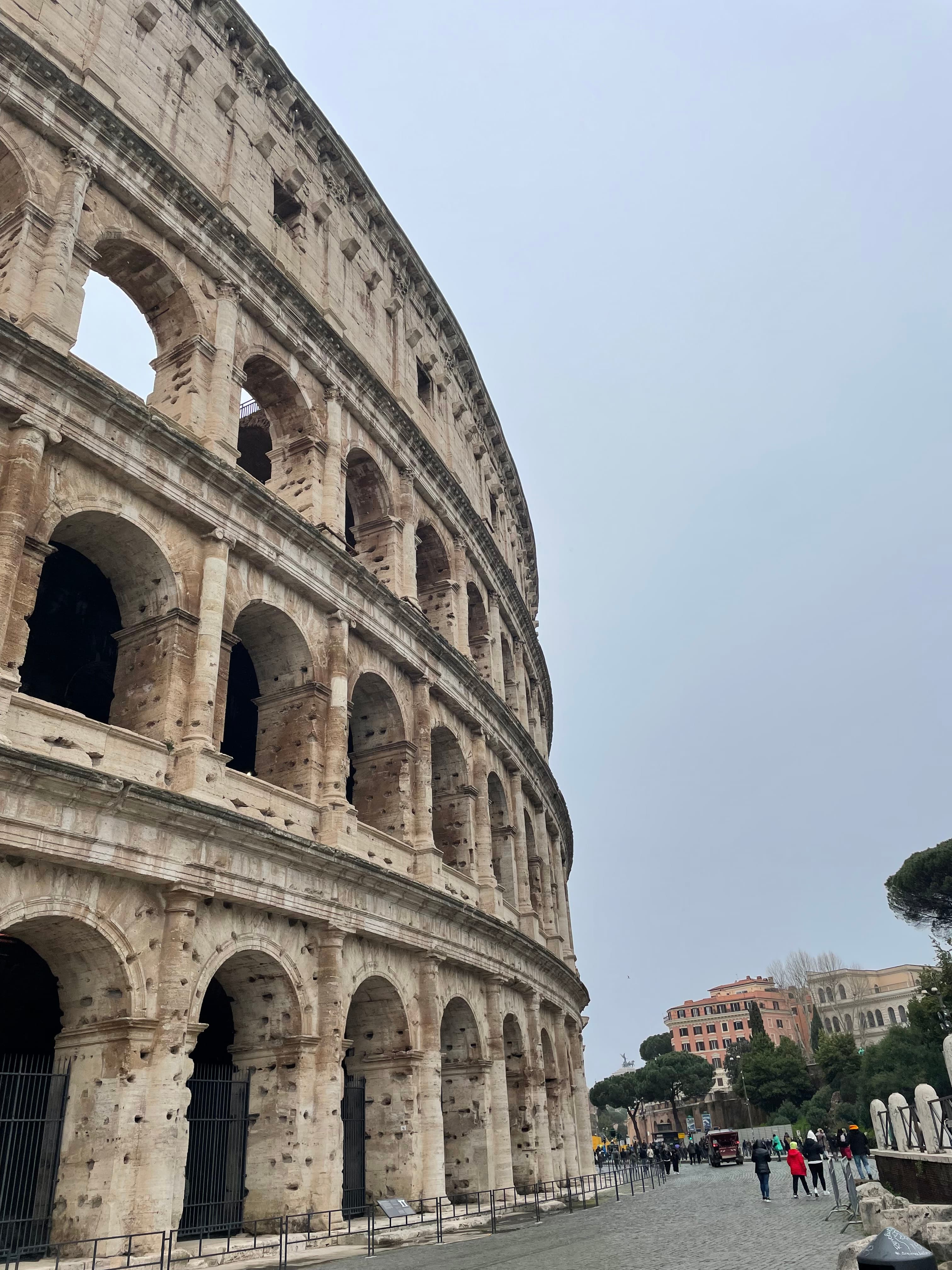 Partial view of the Colosseum in Rome on a cloudy day