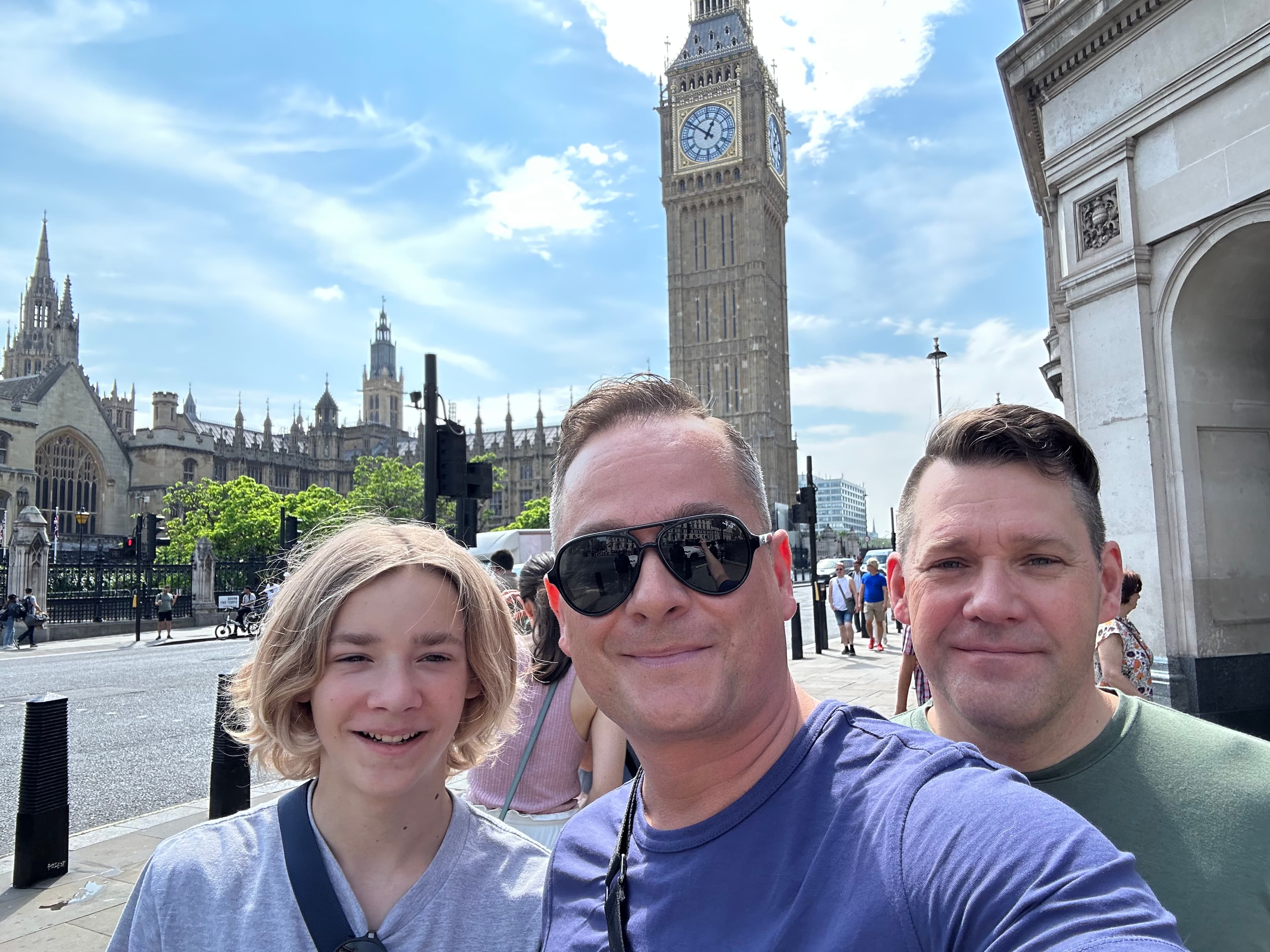 Advisor and his family taking a selfie with Big Ben visible in the background