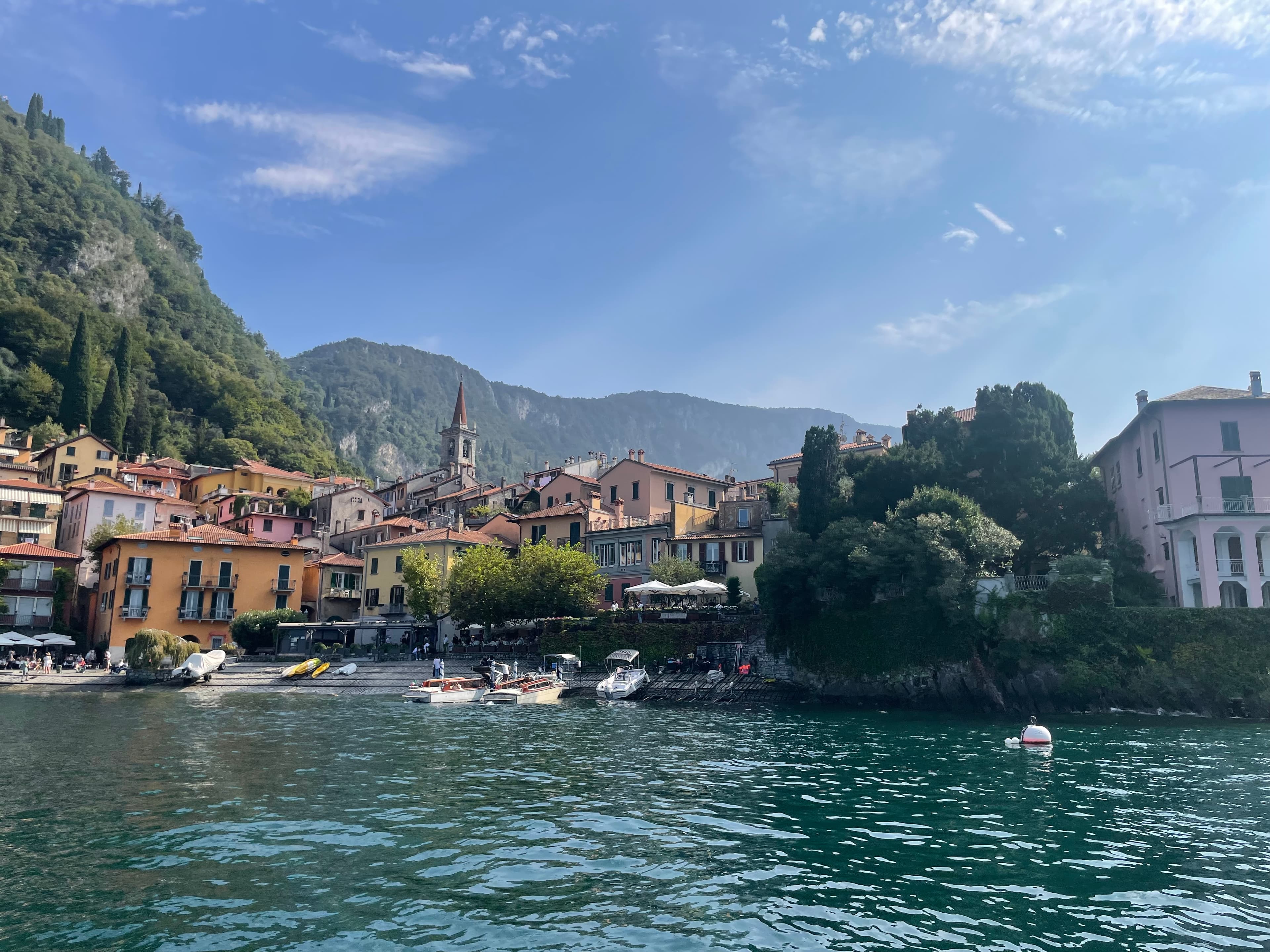 Aerial view of a lake with surrounded by buildings during the daytime.