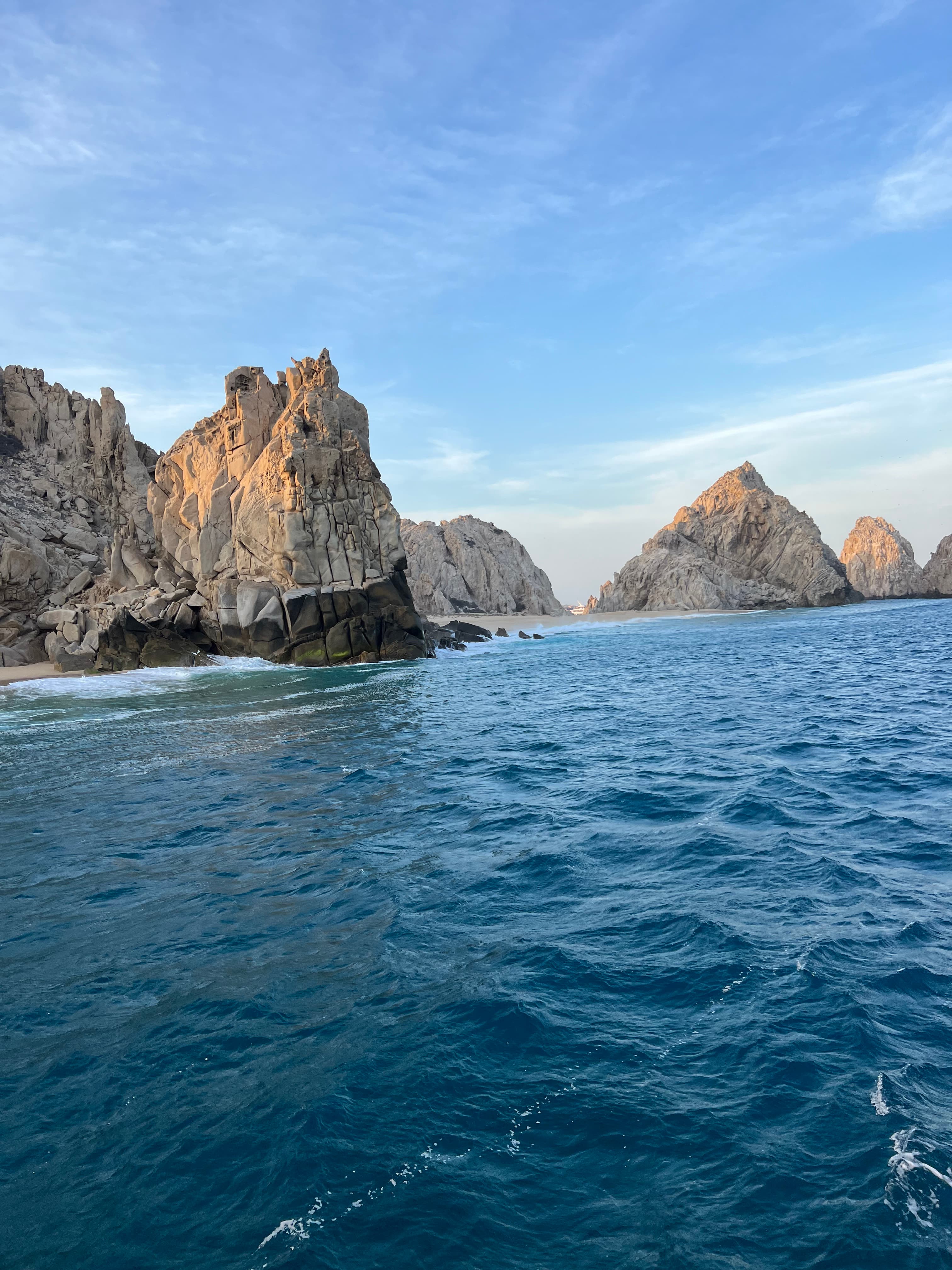 Rocky islands over blue water.