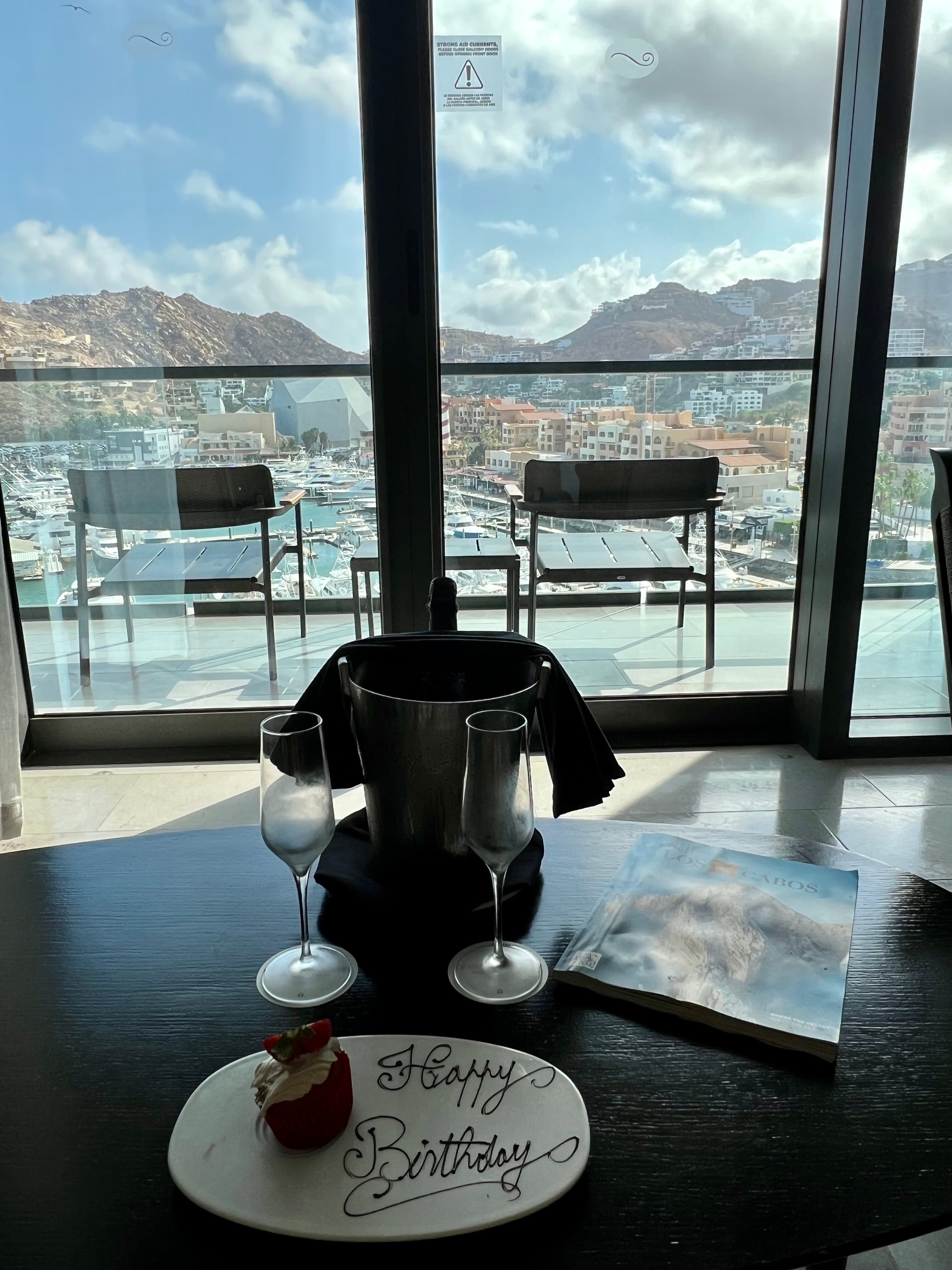 Birthday glasses of champagne with views.