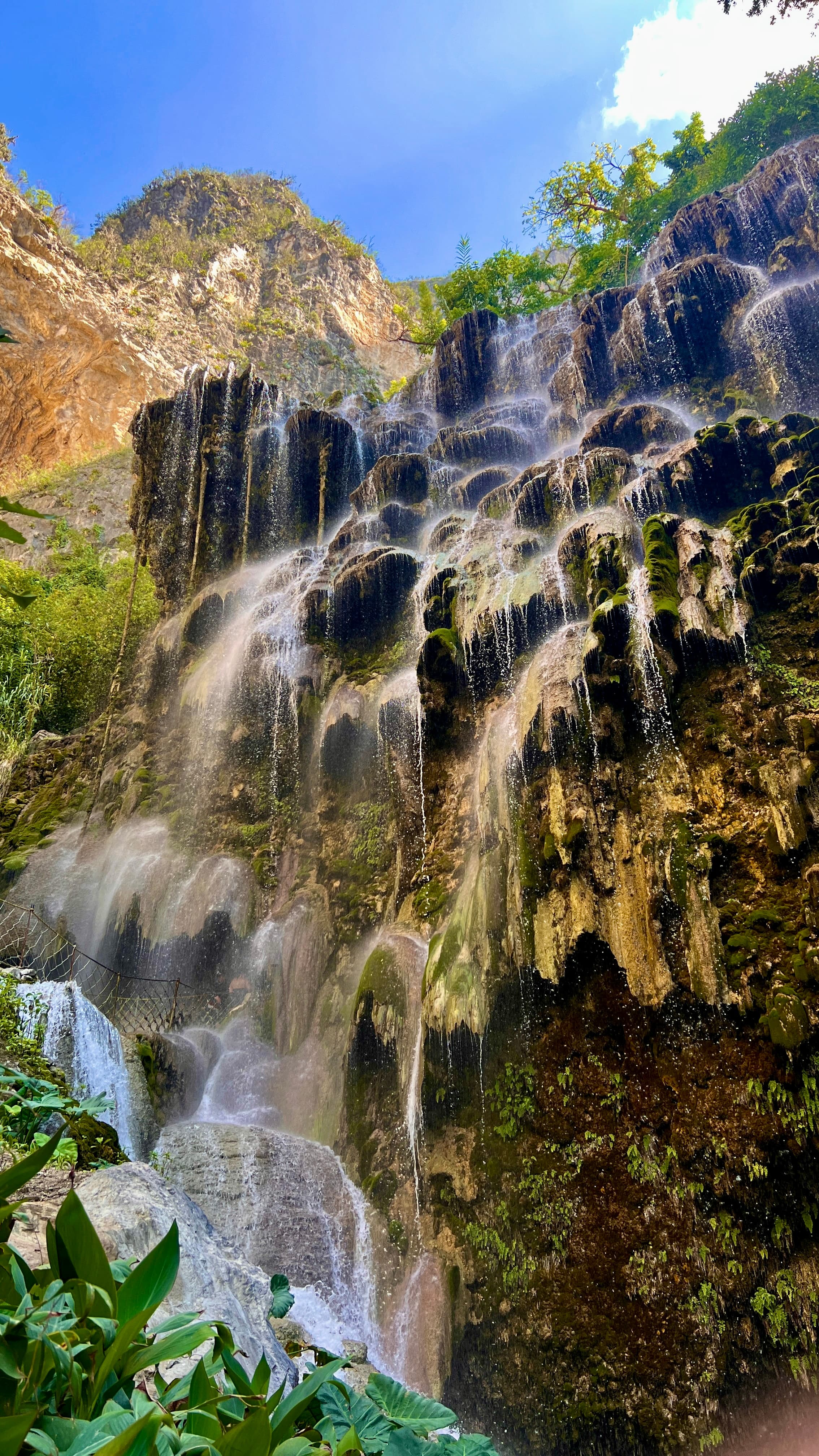 Photo of a waterfall during the daytime.