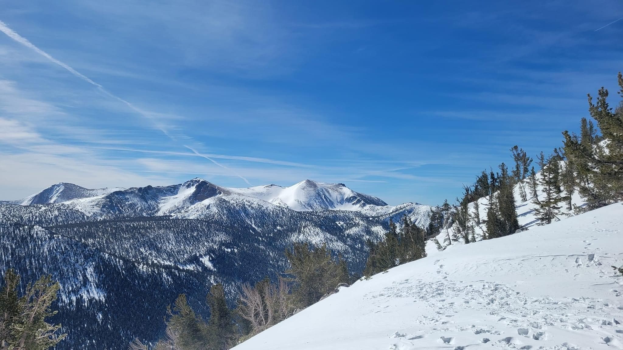Beautiful view of a mountain landscape covered in snow at Lake Tahoe under sunny skies