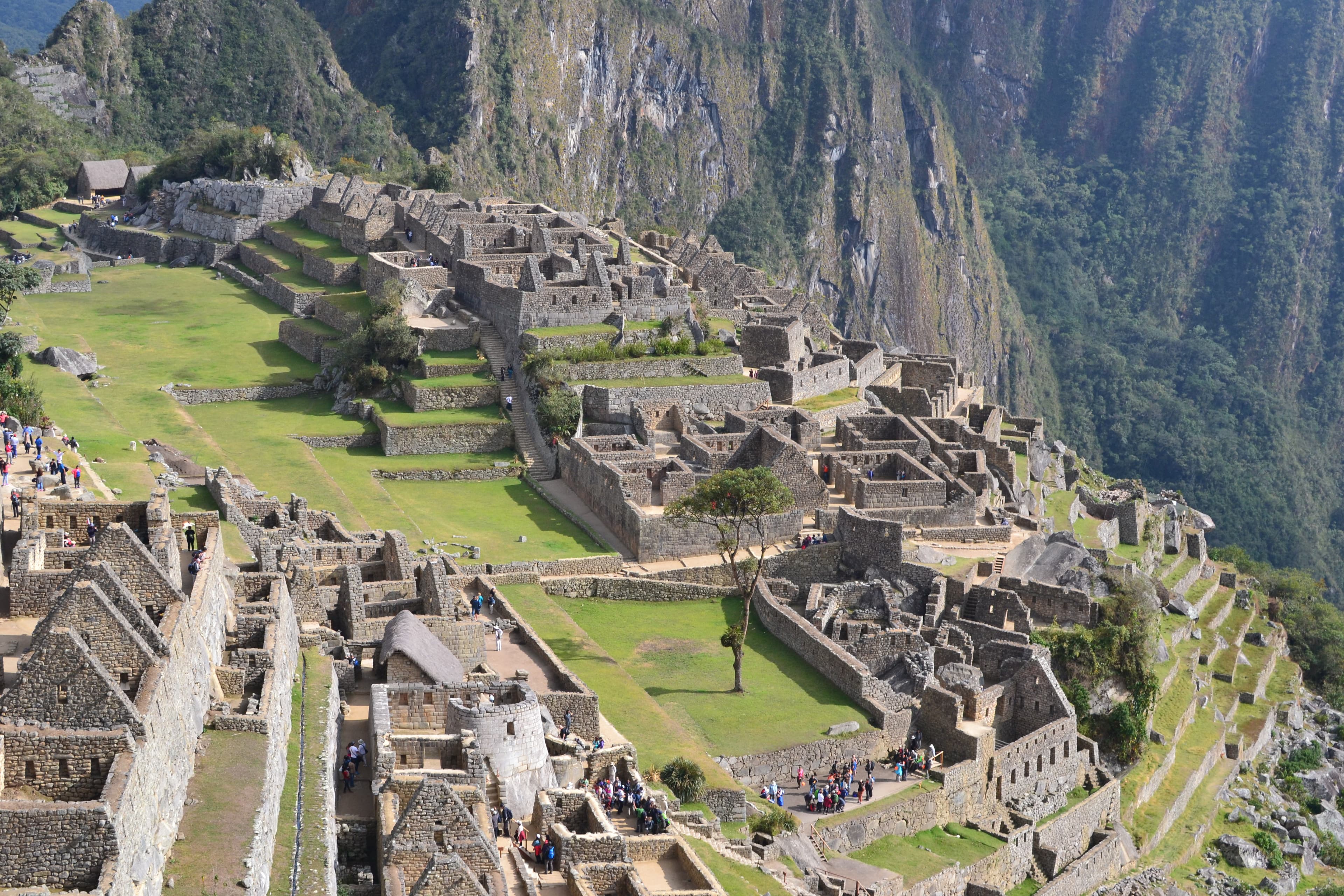 Beautiful aerial view of old buildings set amid a mountainous landscape on a sunny day