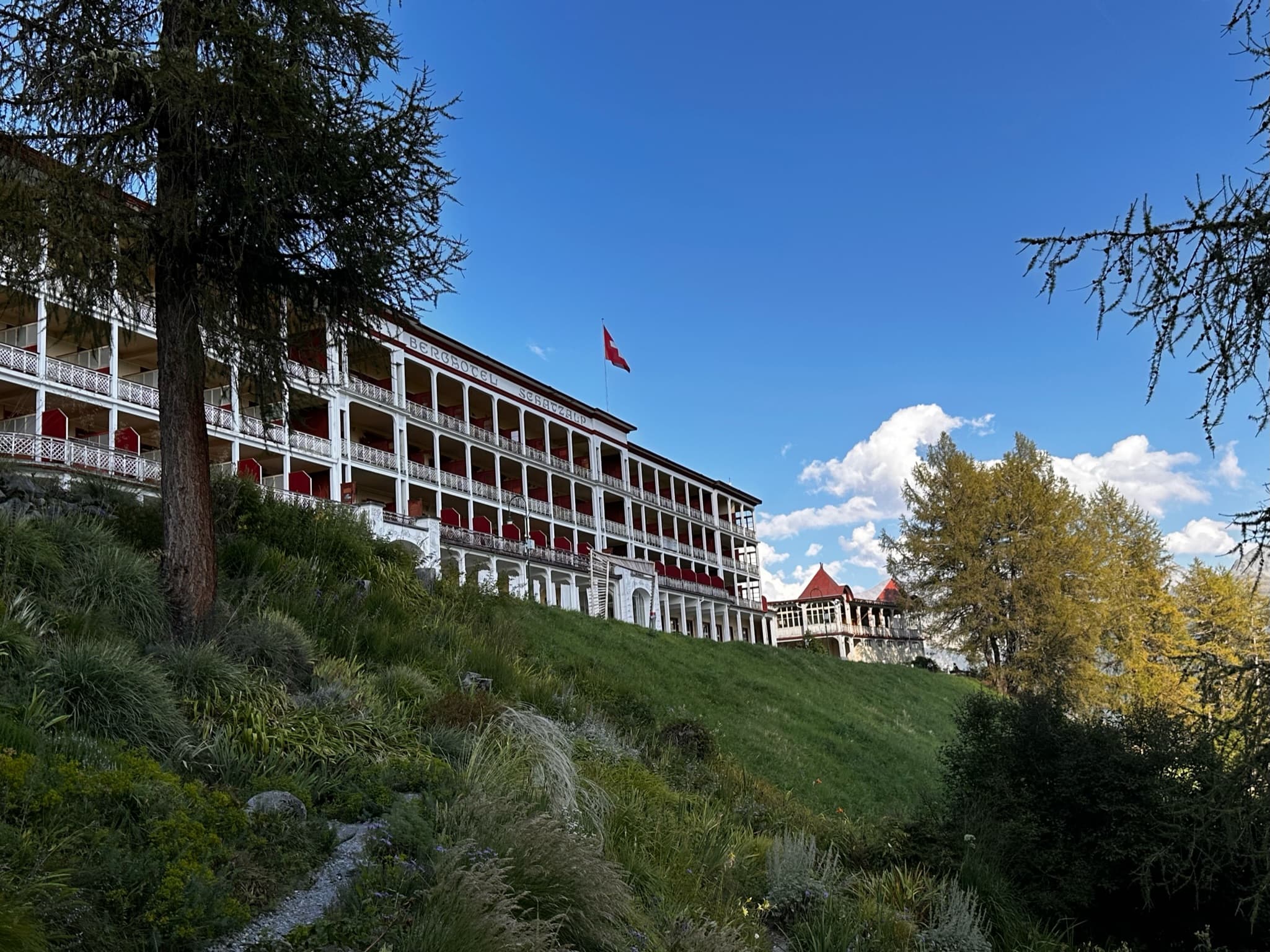 View of a building atop a hill during the daytime.
