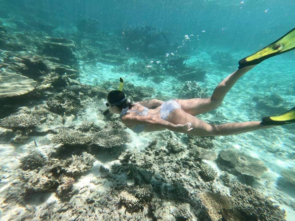 Advisor on a dive in the ocean.