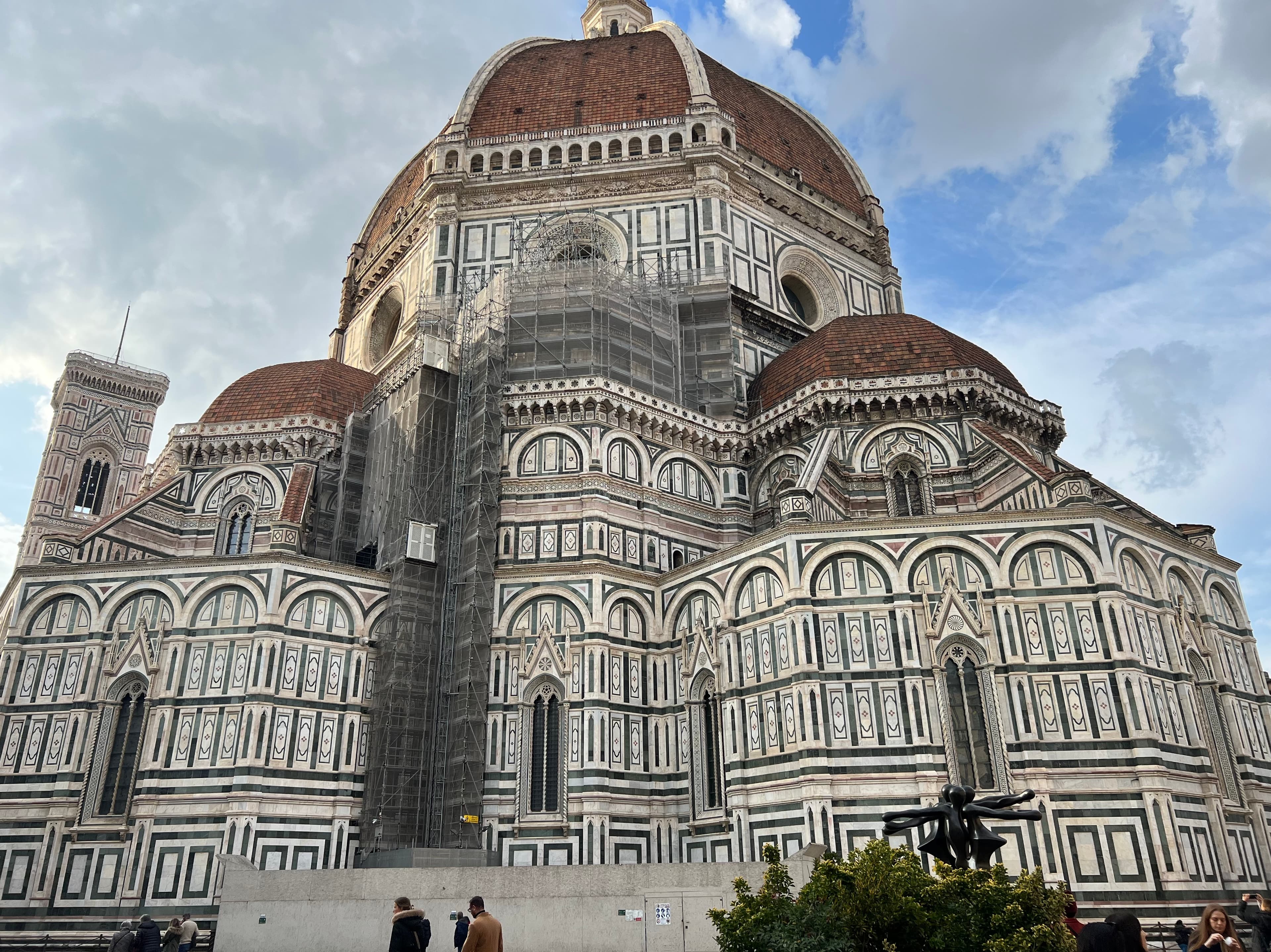 An ornate exterior of a dome-shaped building.