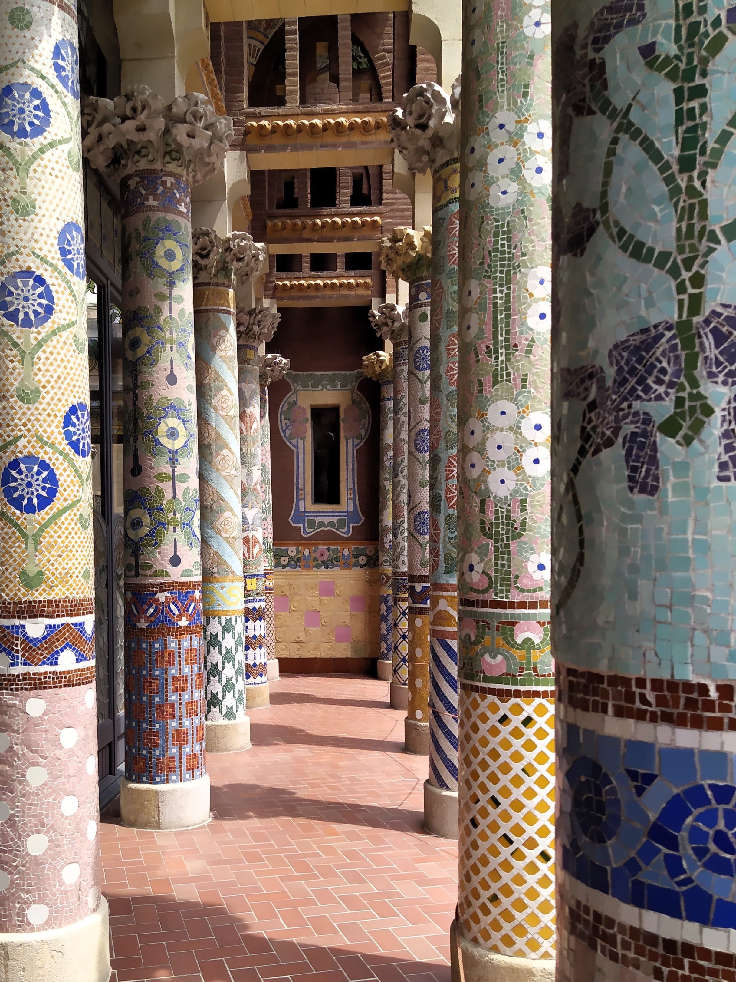View of an outdoor pathway with beautiful colorful columns